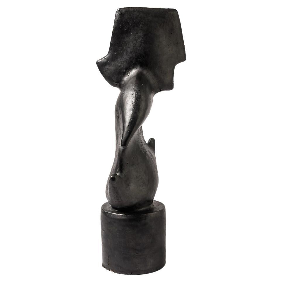 Black glazed stoneware sculpture by Michel Lanos, Circa 1980-1990 For Sale