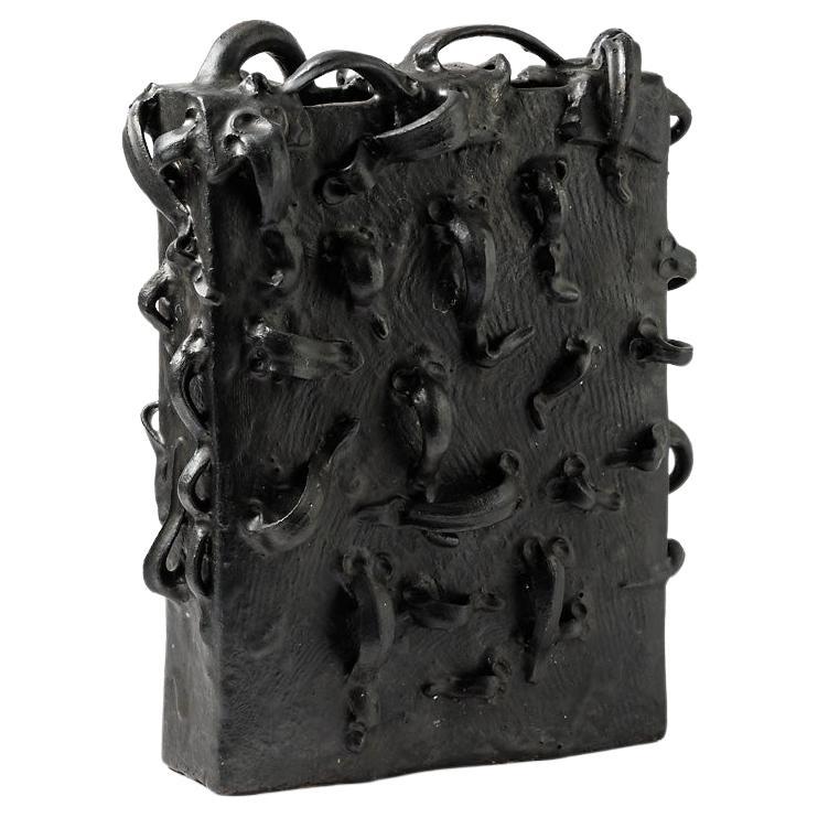 Black glazed stoneware sculpture-vase by Michel Lanos,  Circa 1980-1990 For Sale