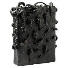 Black glazed stoneware sculpture-vase by Michel Lanos,  Circa 1980-1990