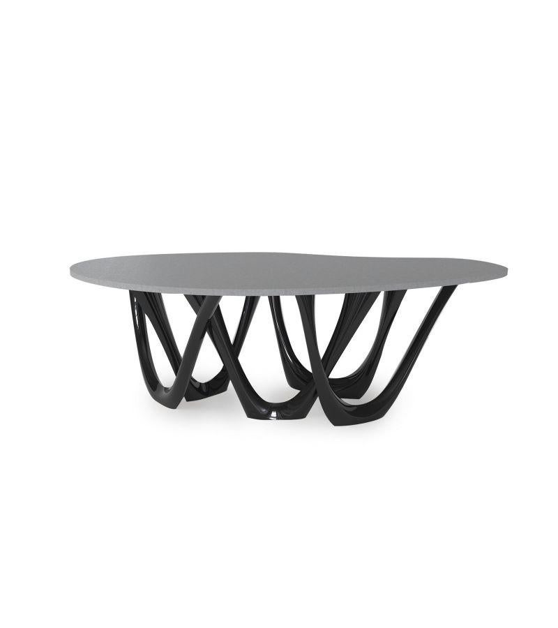 Black Glossy concrete steel G-table by Zieta
Dimensions: D 110 x W 220 x H 75 cm 
Material: Concrete top. Carbon steel base. 
Finish: Powder-Coated. Glossy finish. 
Available in colors: Beige, black/brown, black glossy, blue-grey, concrete grey,