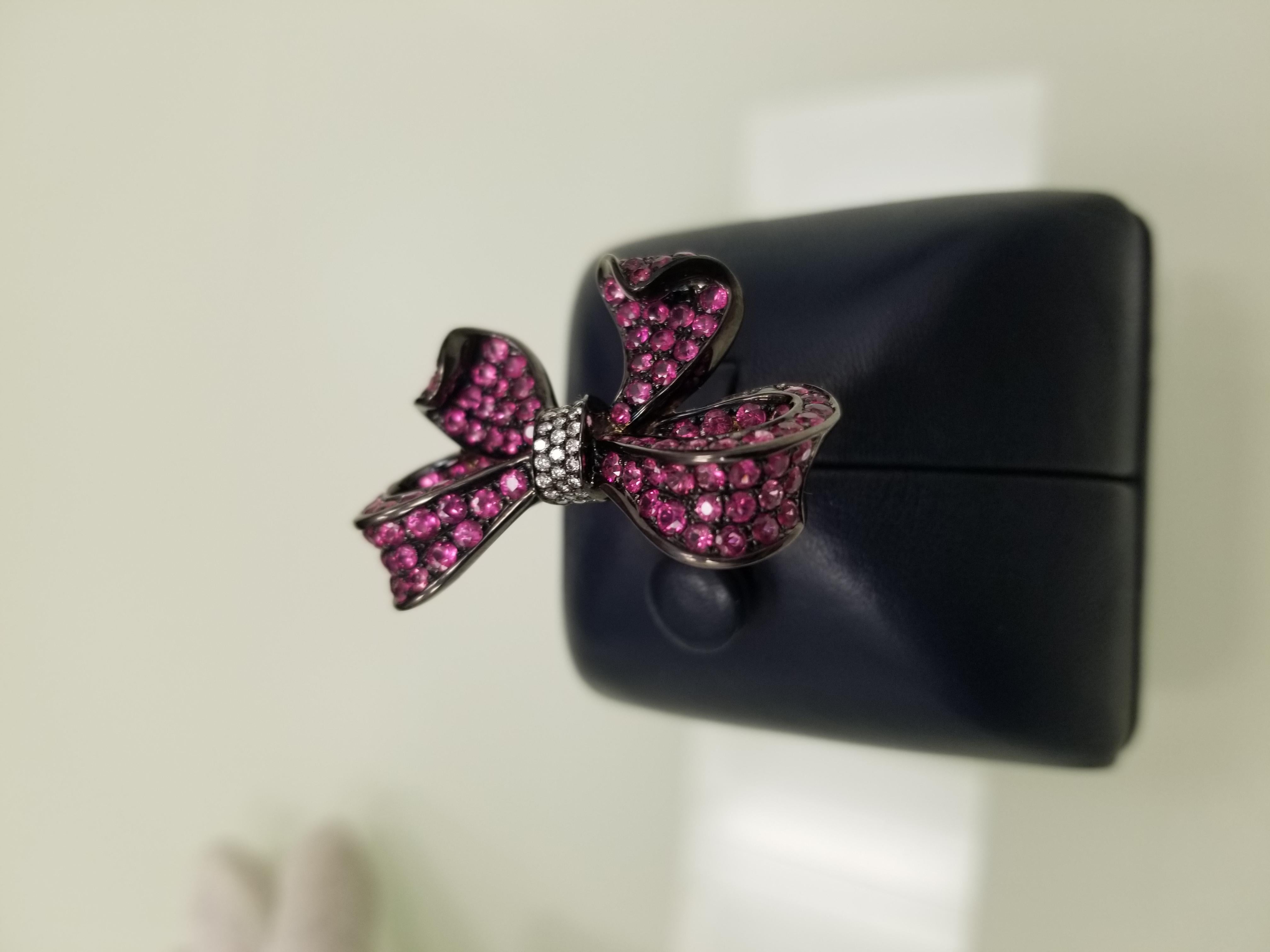 Black gold  Bow ring with ruby's and diamonds For Sale 1