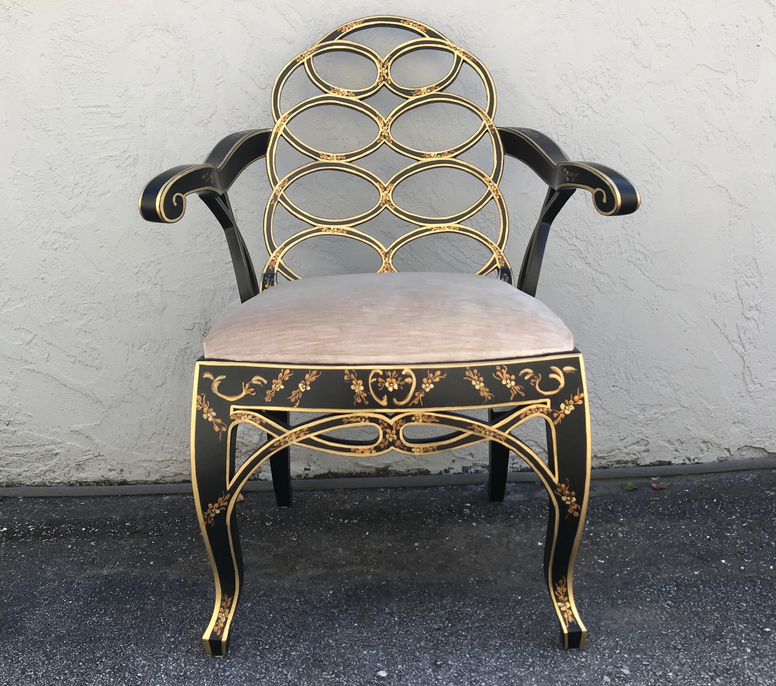 Black & gold painted chinoiserie armchair with champagne velvet seat & cut out swirled back.