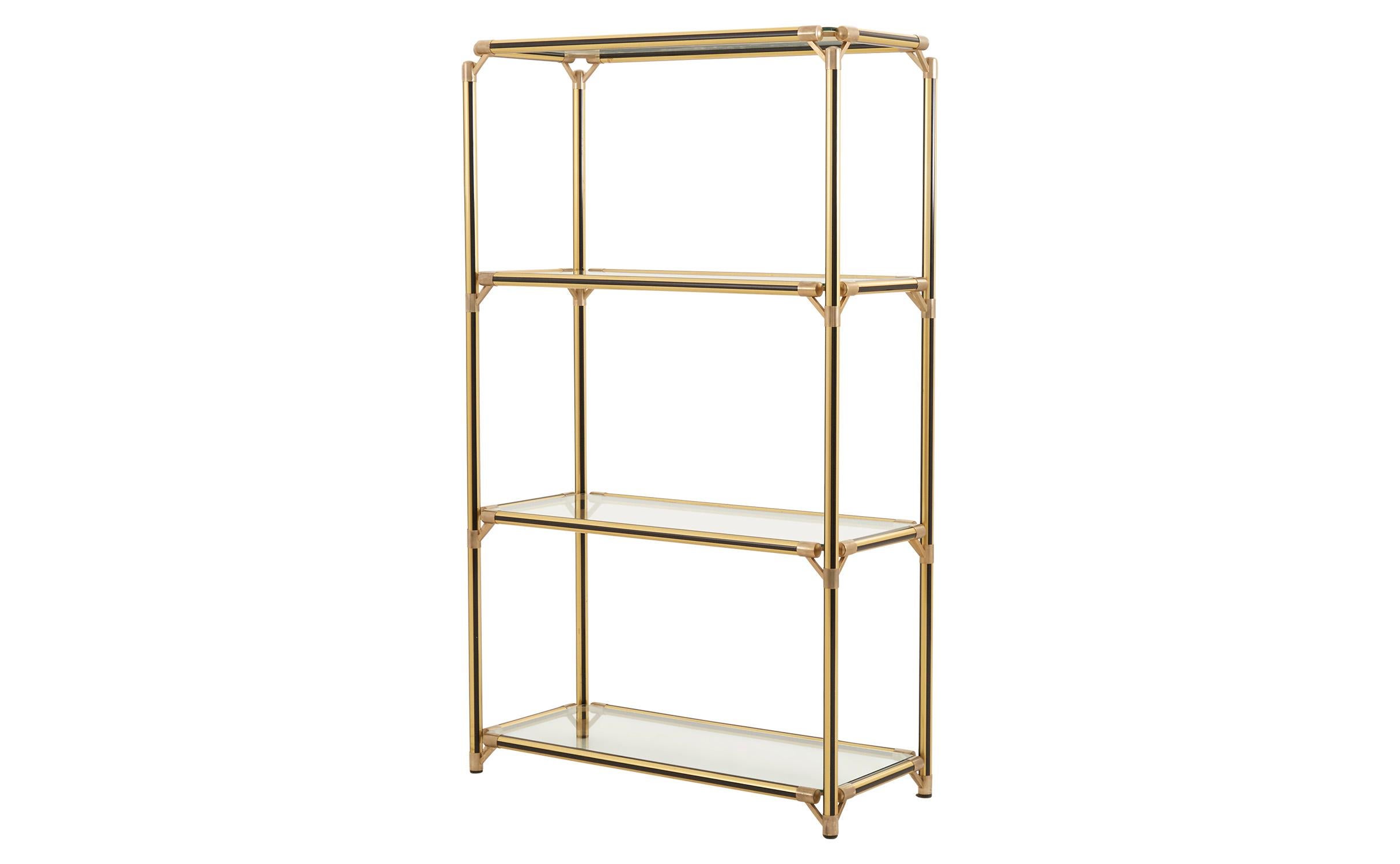 • Black and gold metal frame
• Brass details
• Original glass shelves
• 20th century
• France
• Measures: 38