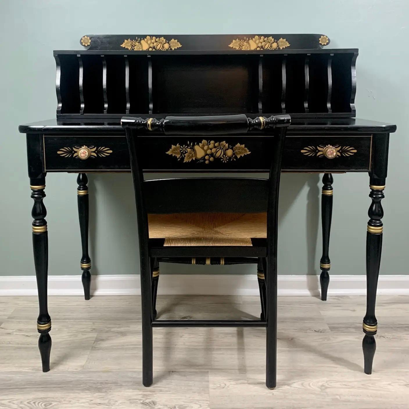A stunning vintage two-piece set, wonderfully preserved, to add a touch of historical charm to your home décor. Painted in rich black with gold accents featuring the classic Harvest stenciling, beautiful brass/porcelain drawer pulls displaying a