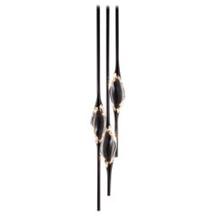 Lampadario rotondo Il Pezzo 12 nero + oro di Il Pezzo Mancante