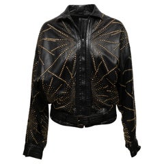 Giacca con borchie in pelle nera e oro Istante by Versace