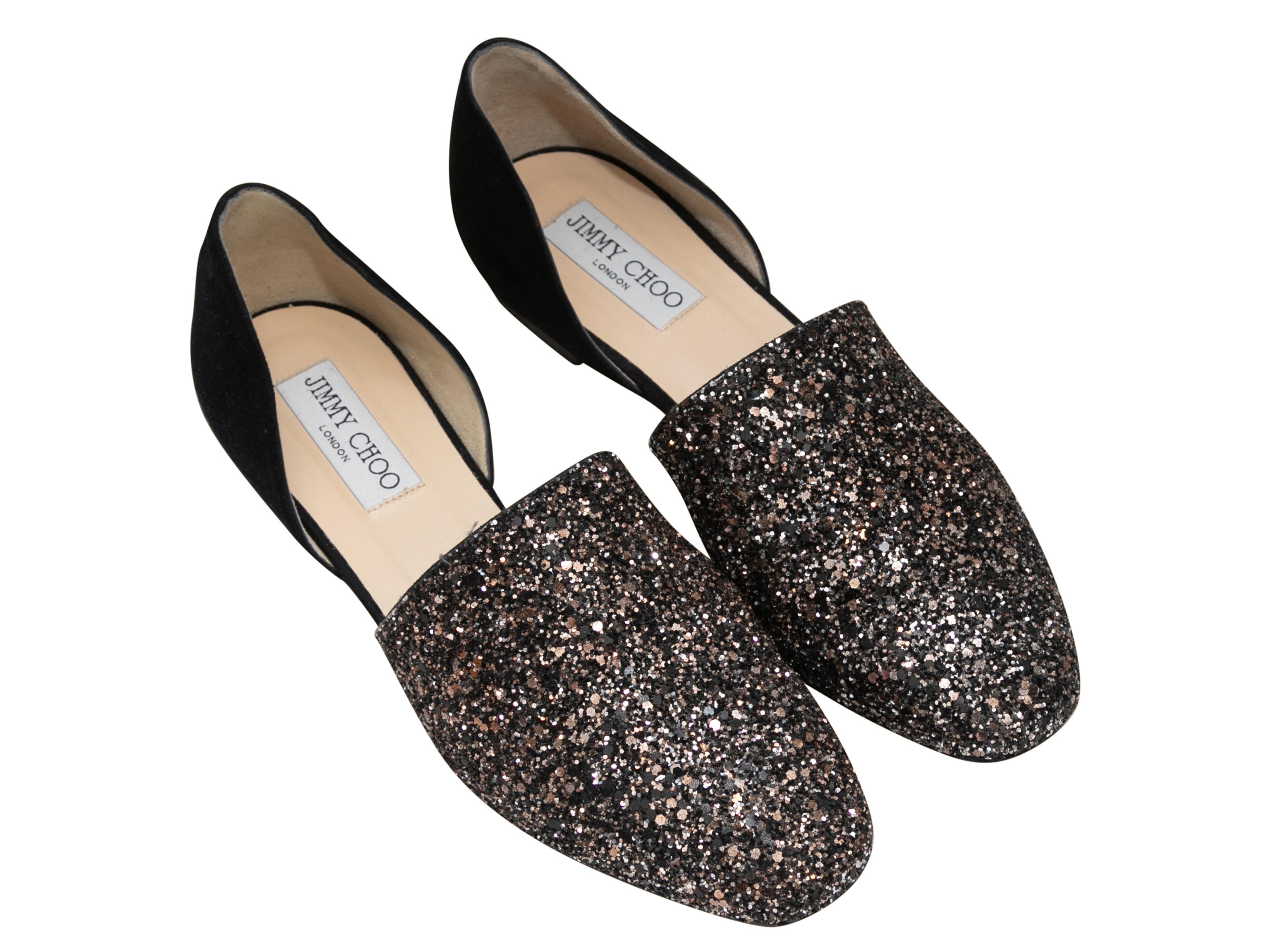 Black and gold suede and glitter d'Orsay flats by Jimmy Choo. 0.125