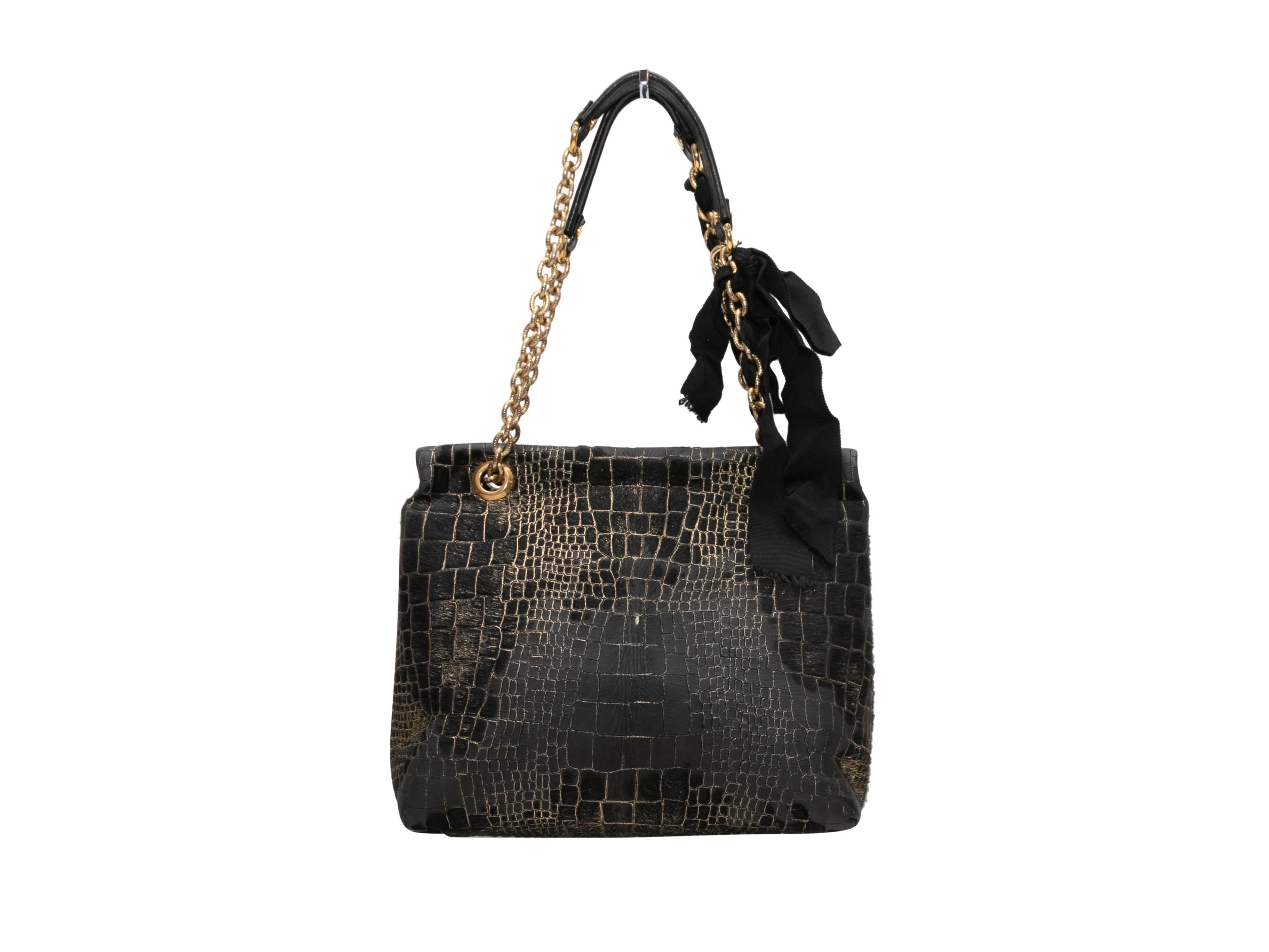 Noir Sac à main Lanvin en poils de poney gaufrés noir et or en vente
