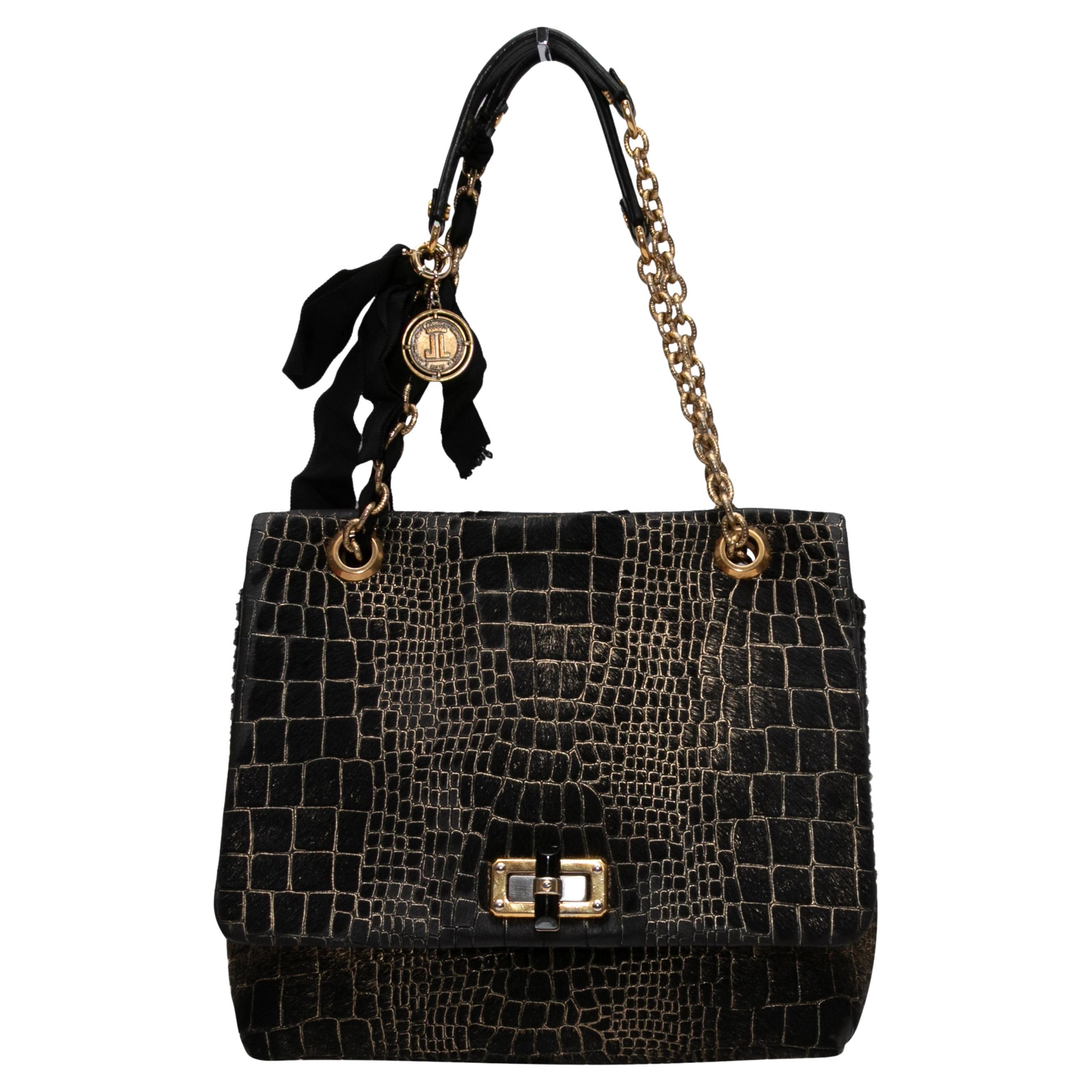 Sac à main Lanvin en poils de poney gaufrés noir et or en vente