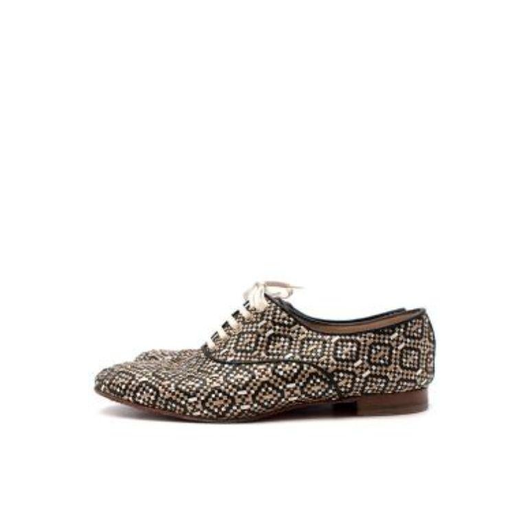 Black & Gold Woven Lace-Up Shoes
 

 - All over circular leather weave 
 - White lace fastening 
 - Black leather piping 
 - Nude leather lining 
 - Classic red sole 
 - Small heel
 

 Material: 
 100% Leather 
 

 Made in Italy
 

 9.5/10 excellent