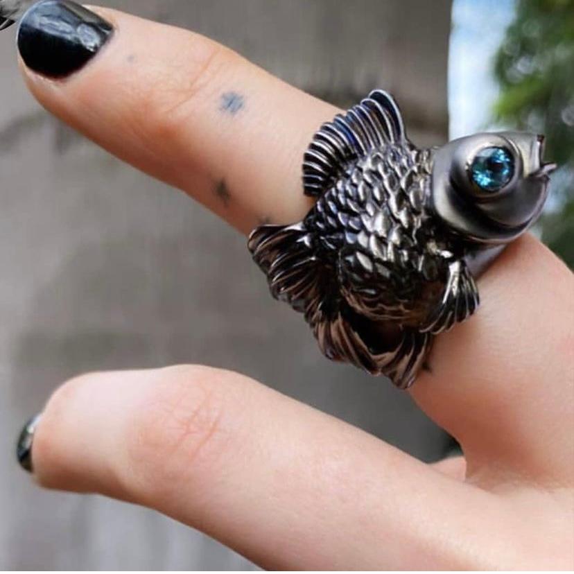 A symbol of good luck and strength, this goldfish ring was created and carved by hand by New York-based artist, Manya Tessler.
No detail had been overlooked in this original piece. The body and tail of this little Telescope goldfish wrap around the