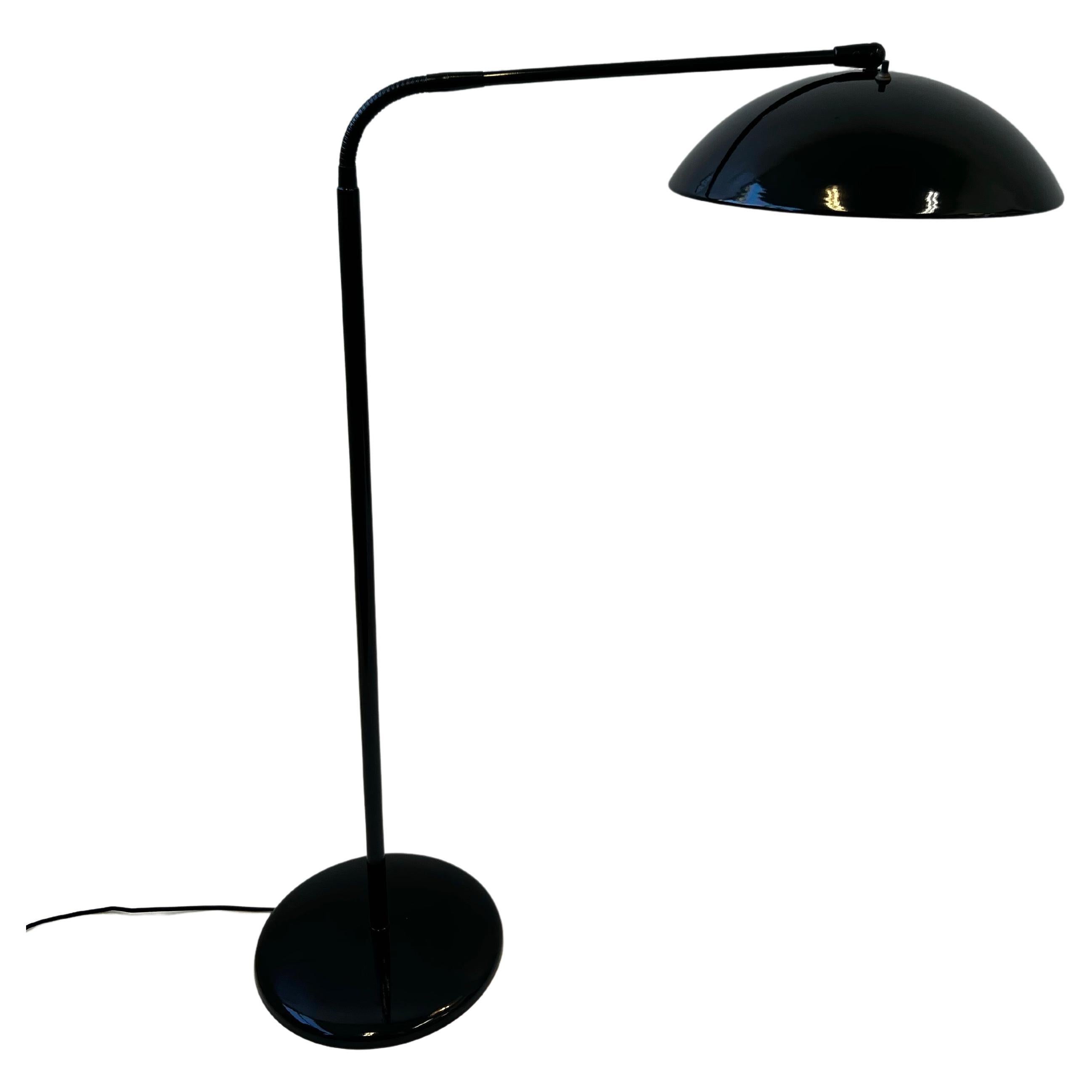 Black powder coated gooseneck floor lamp by Gerald Thurston for Lightolier. 
Newly rewired and powder coated black. 
It takes two 75w Max Edison light bulbs. 

Measurements: 
40.75” High when bend down, 64” High when straight up. Shade is 14.25”