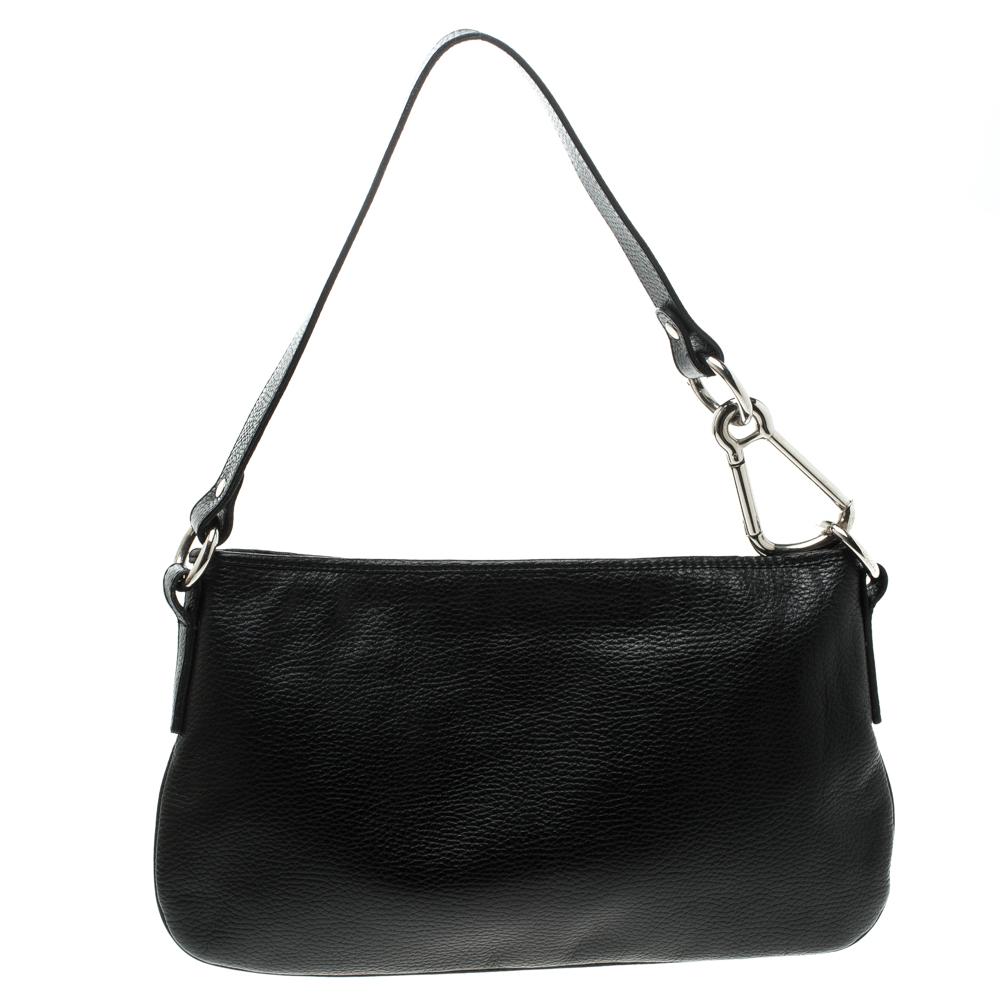 Complete your look with this simple shoulder bag from Burberry. Crafted from black grainy leather the bag features a zip pocket on the front. It comes with a single handle strap and a zip top closure that opens to a spacious fabric lined