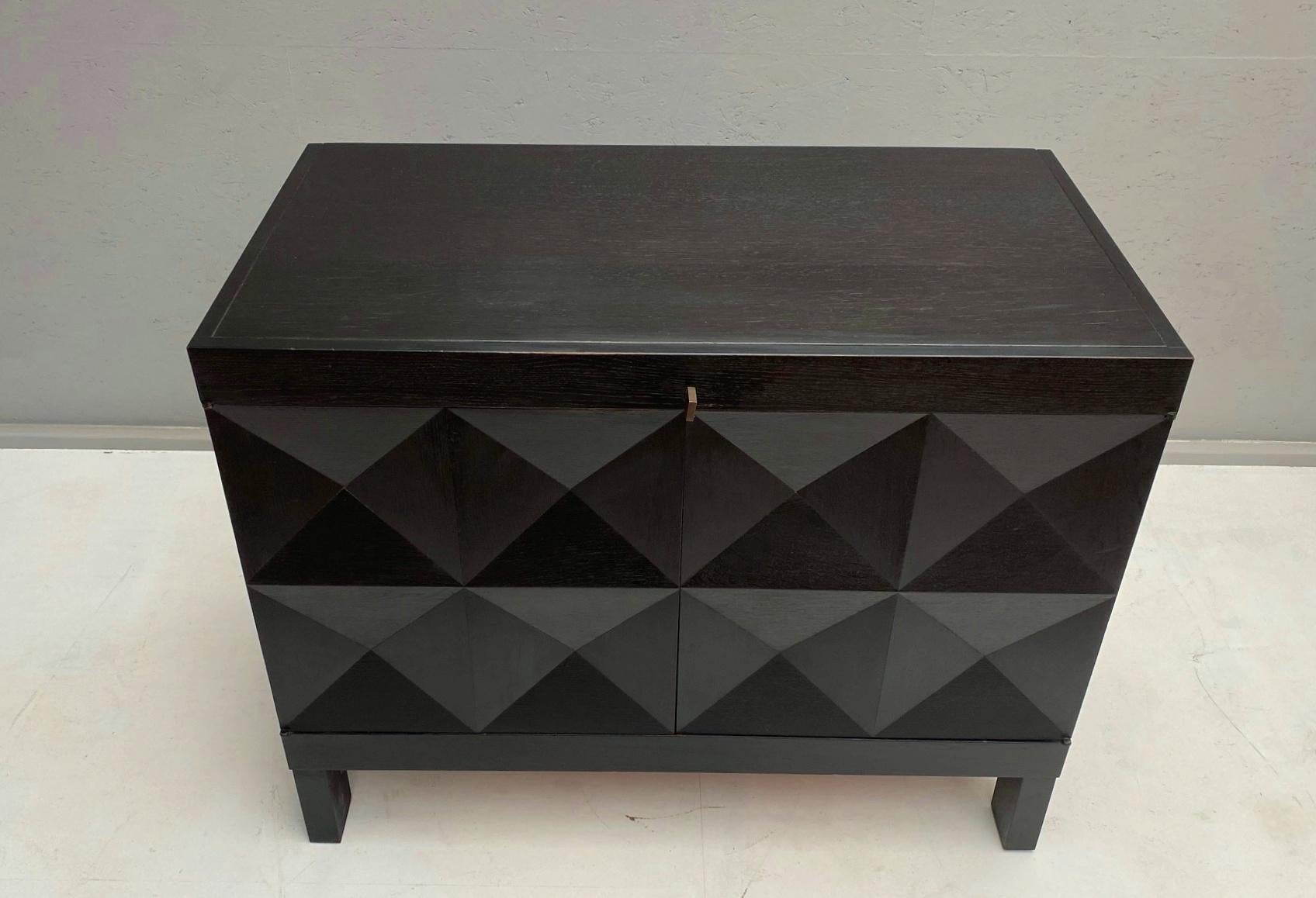 Black graphic cabinet by De Coene, Belgium.