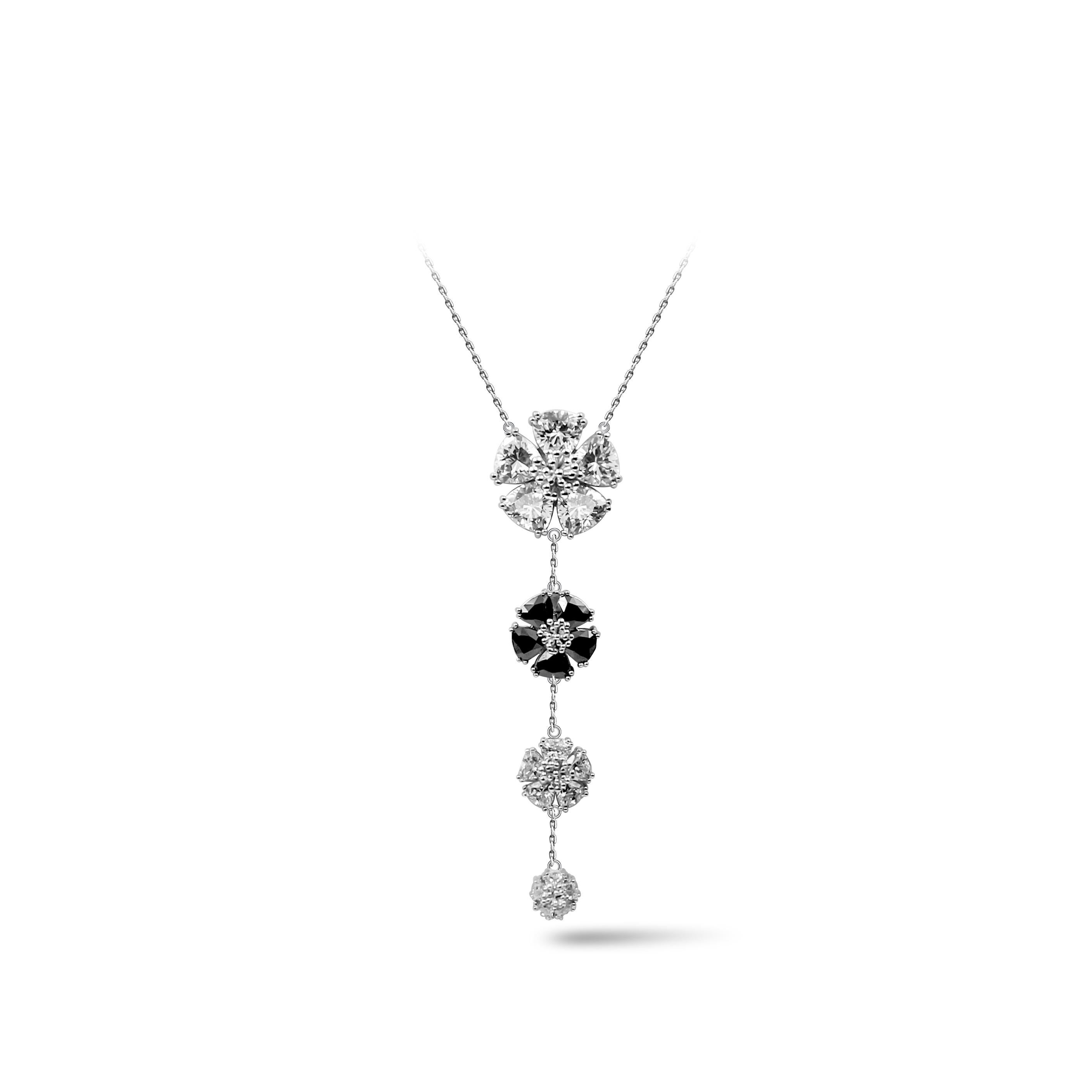 Designed in NYC

.925 Sterling Silver multiple Black & Gray Spinel and White Topaz Graduated Blossom Stone Lariat Necklace. No matter the season, allow natural beauty to surround you wherever you go. Graduated blossom stone lariat necklace: