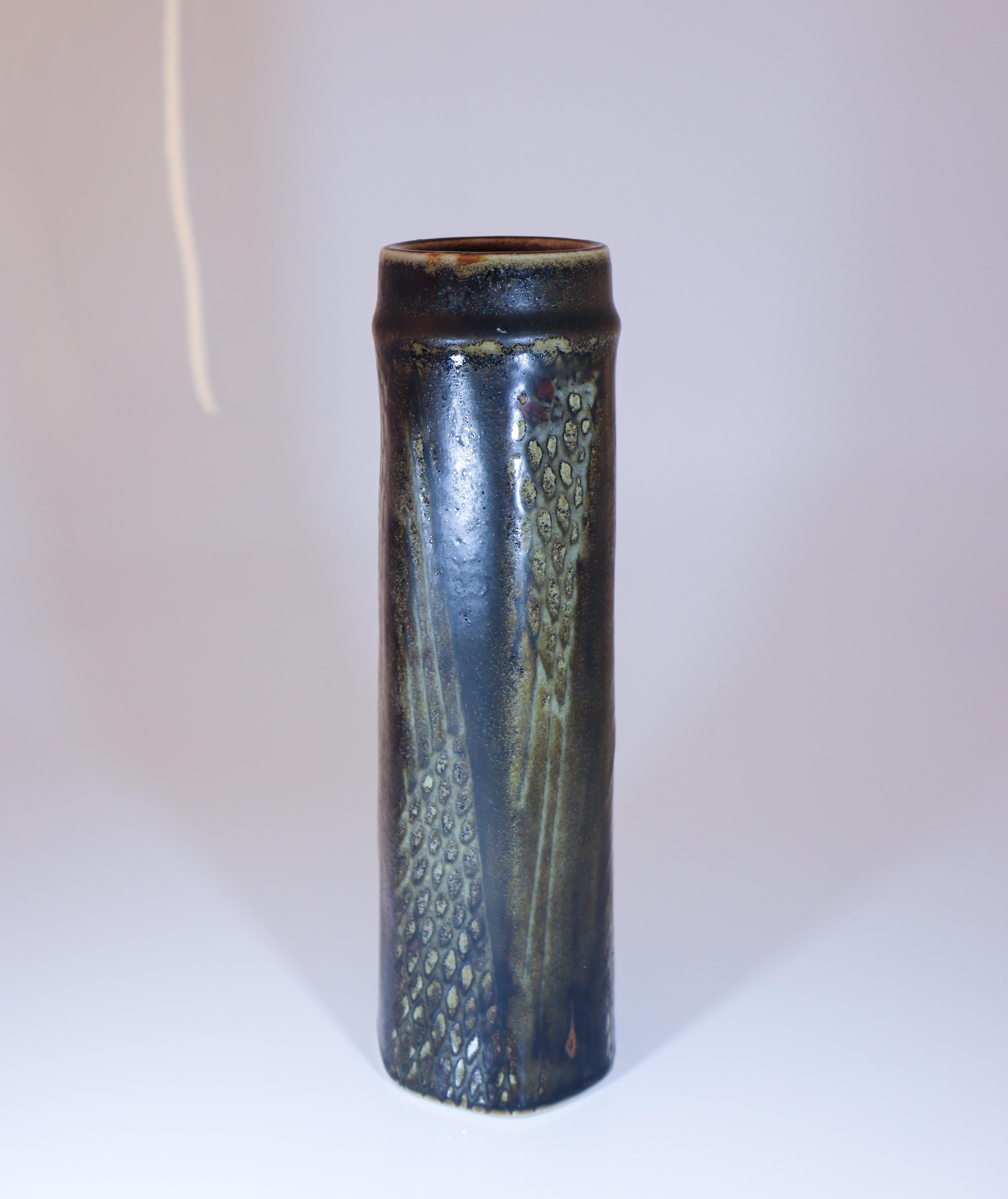 A straight black & gray vase designed by Carl-Harry Stålhane at Rörstrand atelier, It is 25 cm (10