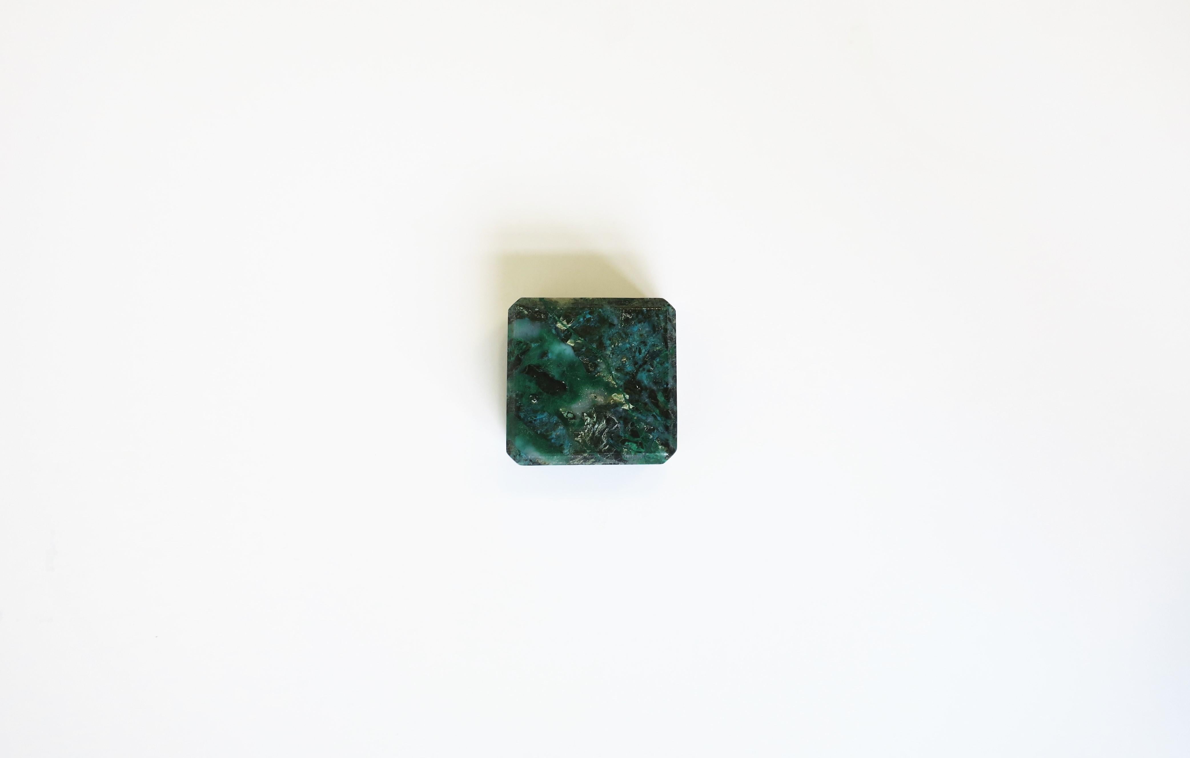 A beautiful small natural stone object paperweight, circa 20th century. Piece is a hard-stone, in a gem cut shape (square, beveled edge, cut corners), polished smooth. Hues include emerald green, light green, light blue and black. A great decorative