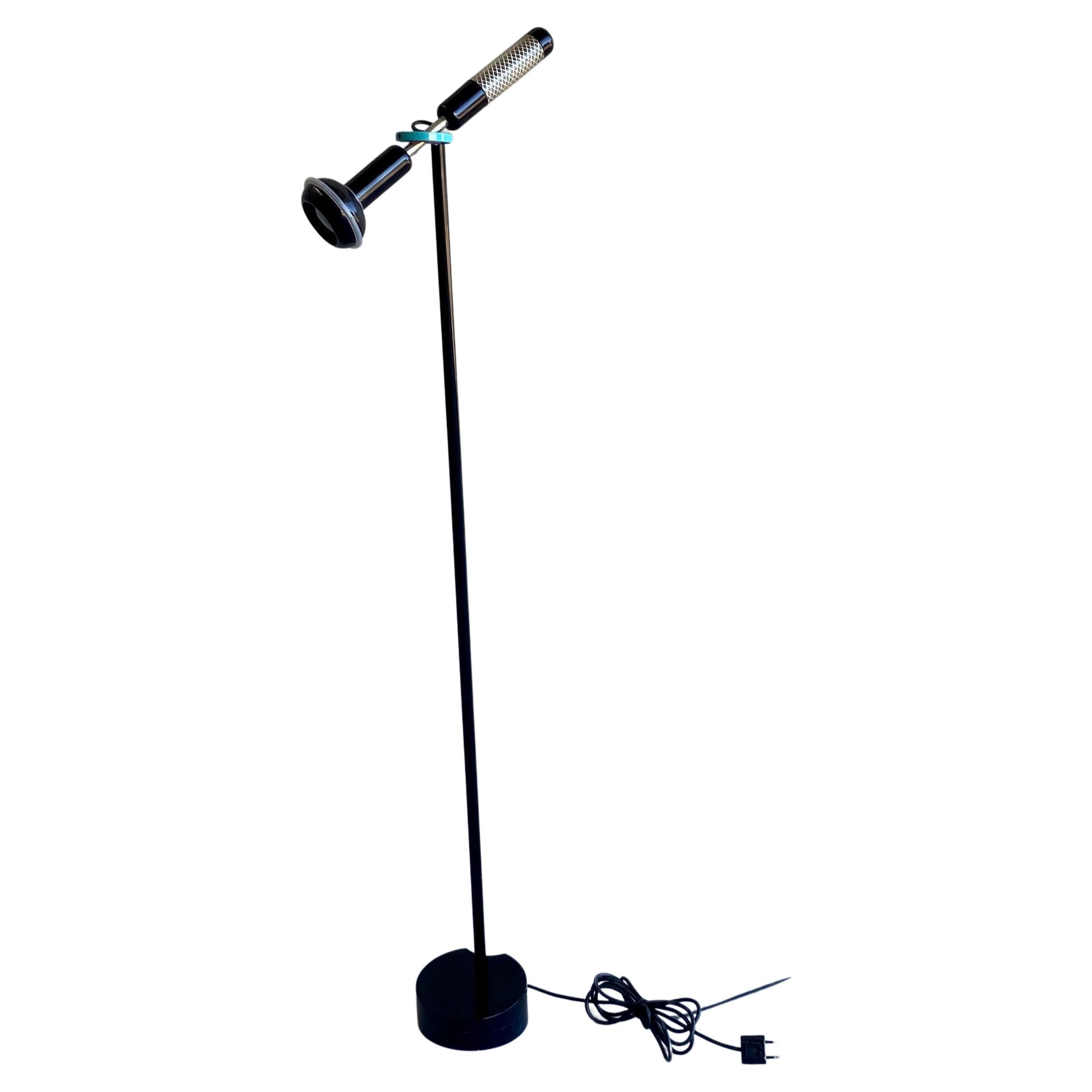 BLACK 'GRIP' FLOOR LAMP BY ACHILLE CASTIGLIONI FOR FLOS, 1980S

Looking for a statement piece to elevate your home decor? Look no further than the Black 'Grip' Floor Lamp by Achille Castiglioni for Flos, originally designed in the 1980s and now