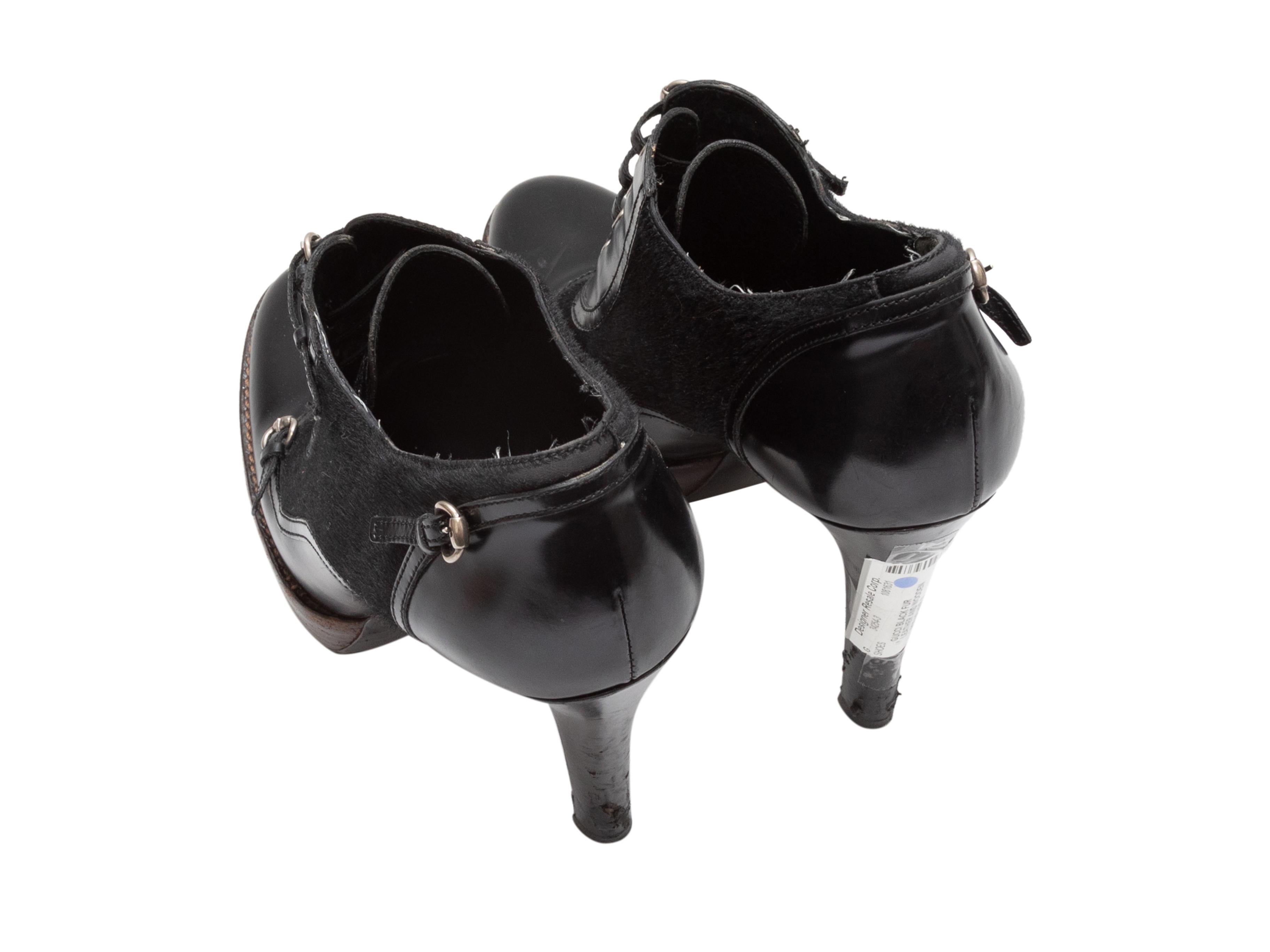 Femenino o masculino Botines de plataforma de piel y pelo de potro negros de Gucci