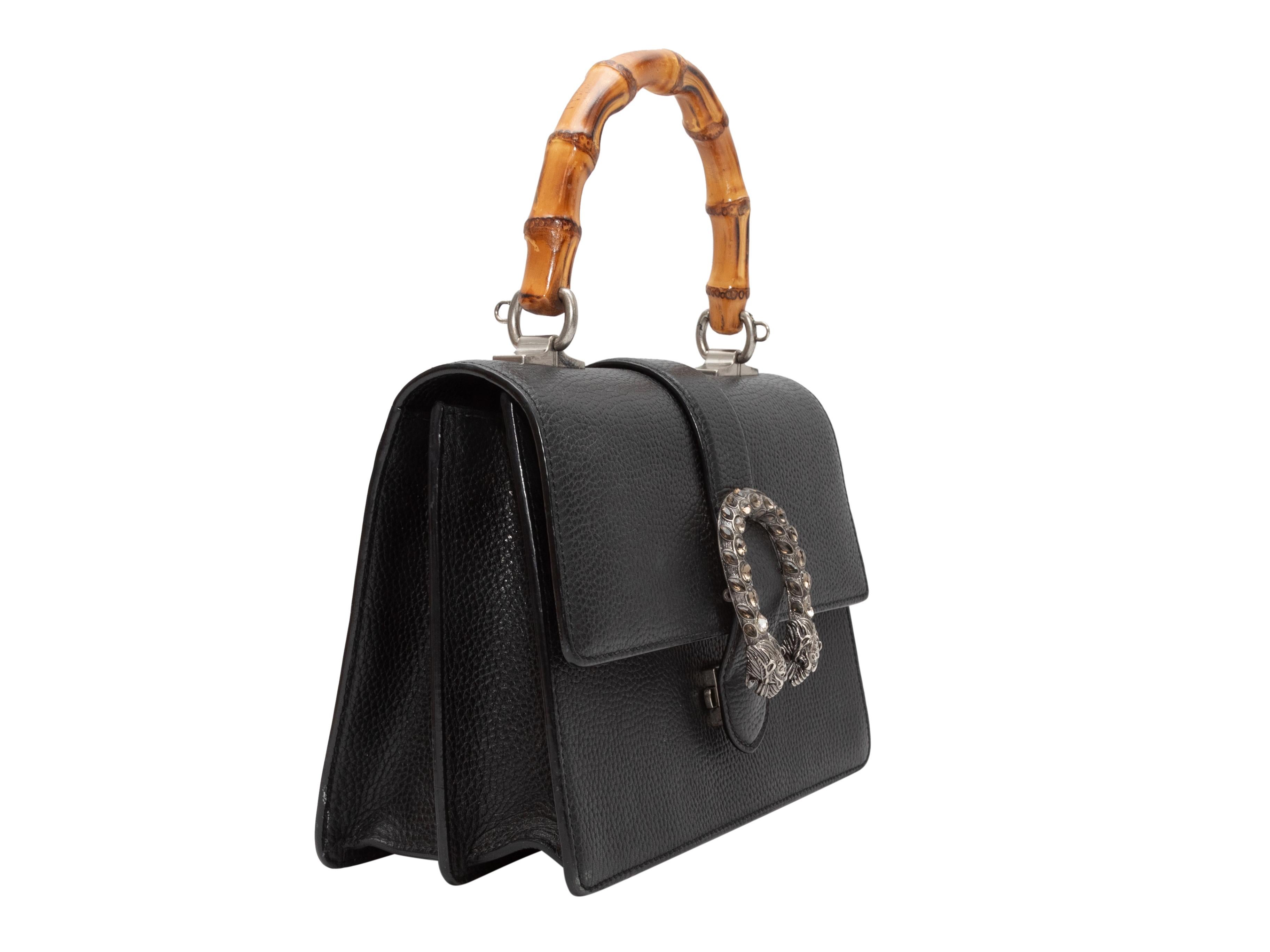 Black Gucci Medium Dionysus Bamboo Top Handle Bag. This bag features a leather body, silver-tone hardware, a single bamboo top handle, and a front flap closure. 9.3