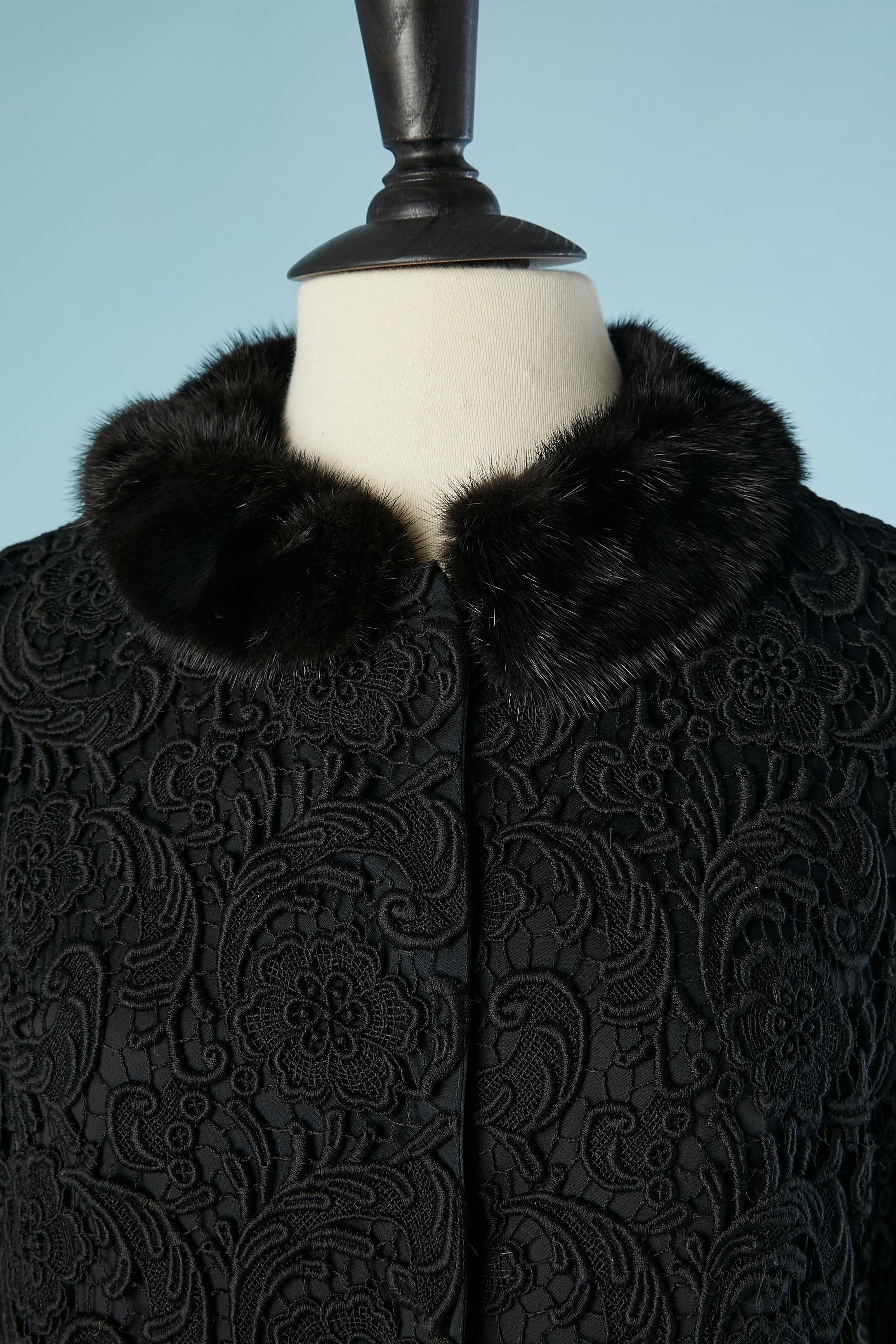 Black guipure evening coat with mink collar. Snap covered with silk to close the middle front. Guipure composition: 90% cotton, 10% polyester.Silk and facing lining. 
Pockets on both side. 
SIZE 42(It) 38(Fr) 