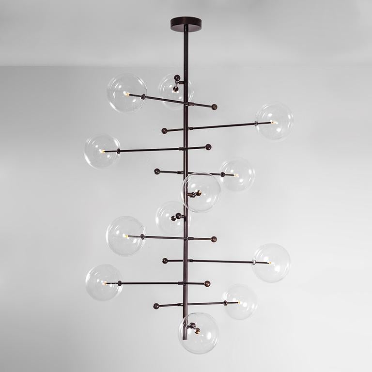 RD15 12 Arms Black Gunmetal Chandelier by Schwung
Dimensions: W 140 x D 140 x H 289 cm
Materials: Solid brass. Hand blown glass globes
Finishes: Black gunmetal. Available also in polished nickel, and lacquered burnished brass. 
All our lamps can be