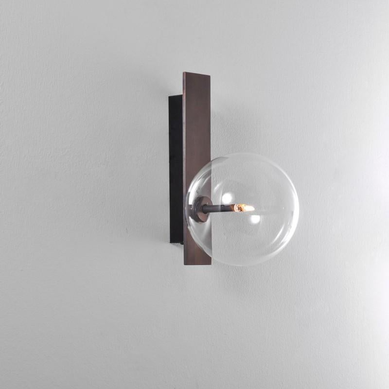 Oslo Black Gunmetal Wall Sconce by Schwung
Dimensions: D 19 x W 15 x H 26 cm 
Materials: solid brass, hand-blown glass globes.
Finish: black gunmetal
Available in finishes: polished nickel or natural brass. Also available in double or triple bulb.