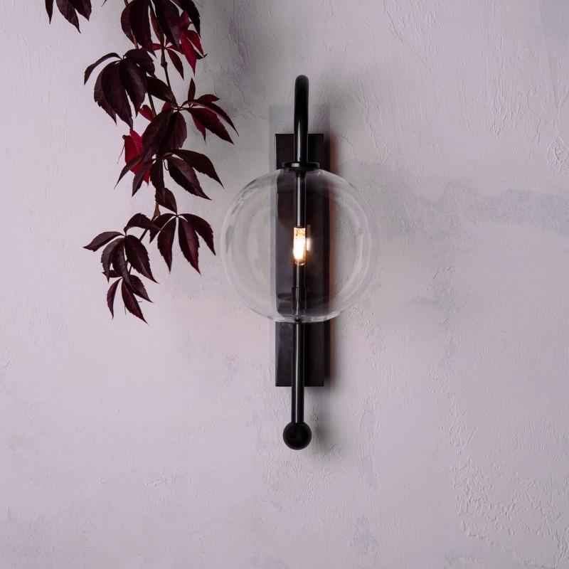 Black gunmetal wall sconce by Schwung
Dimensions: D 23.2 x W 15 x H 37.1 cm 
Materials: Solid brass, hand-blown glass globes.
Finish: Black gunmetal
Available in finishes: Polished nickel or natural brass.
All our lamps can be wired according to