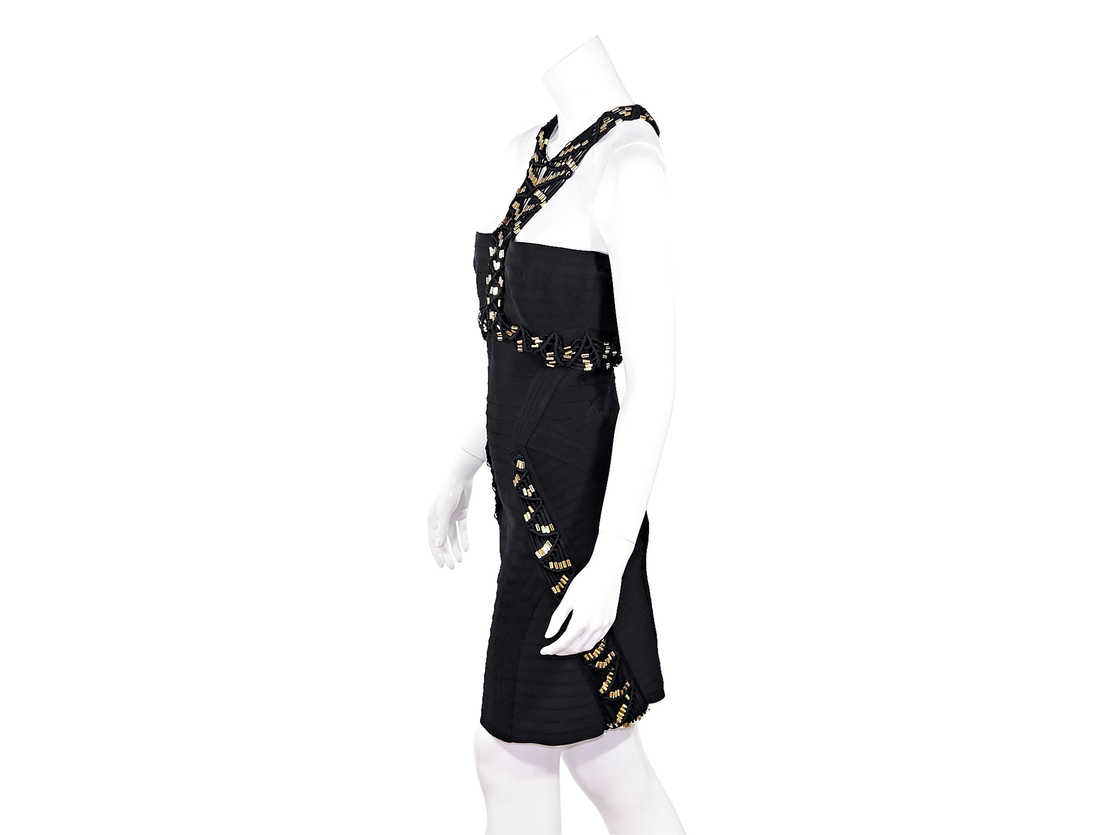 Product details:  Black embellished bandage dress by Herve Leger.  Halterneck.  Sleeveless.  Concealed back zip closure.  36