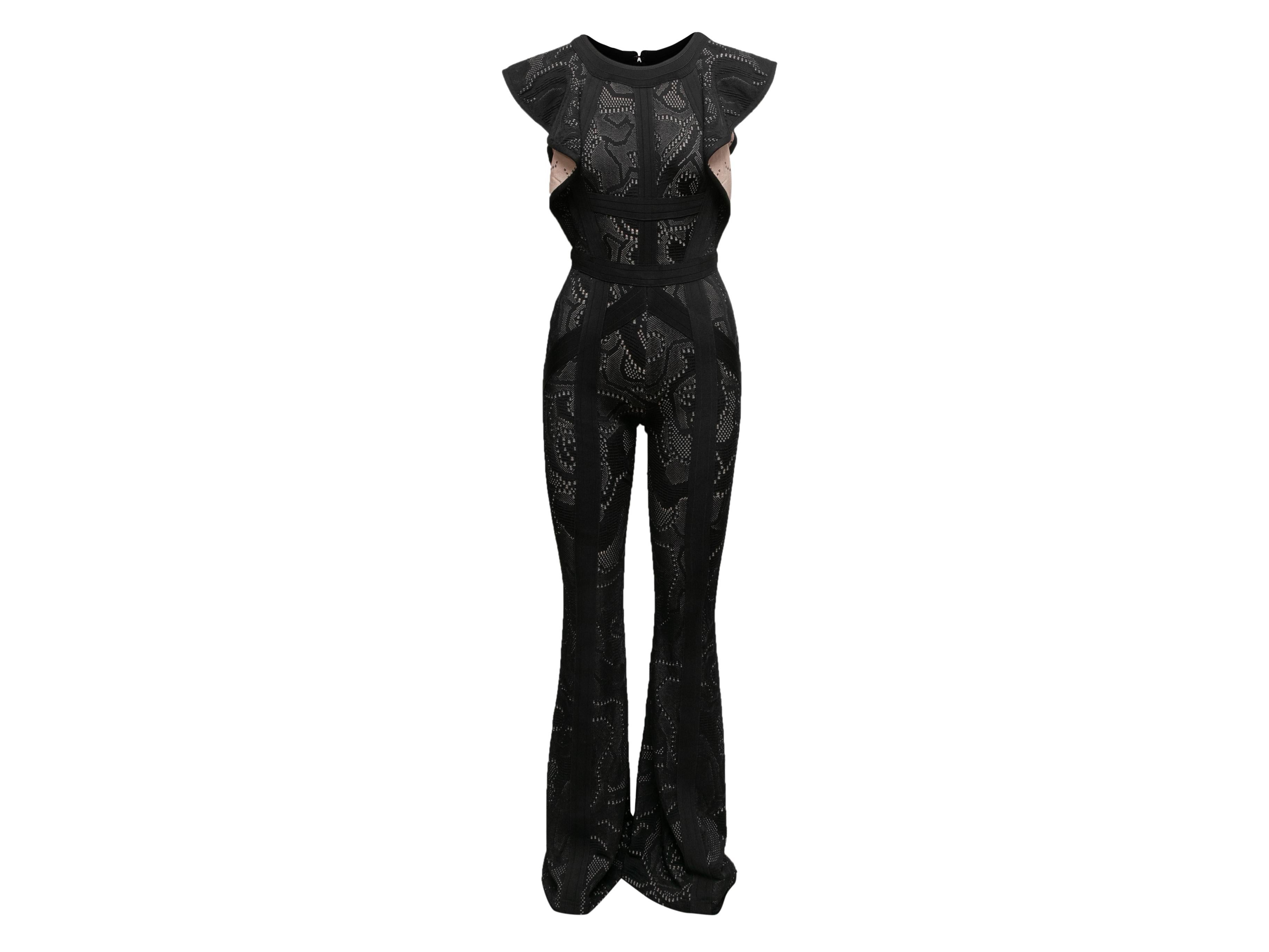Black knit cap sleeve jumpsuit. Crew neck. Flared legs. Zip closure at back. 28