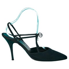 black hight heel pump covered of fabric with elastic bow Massaro for Chanel 