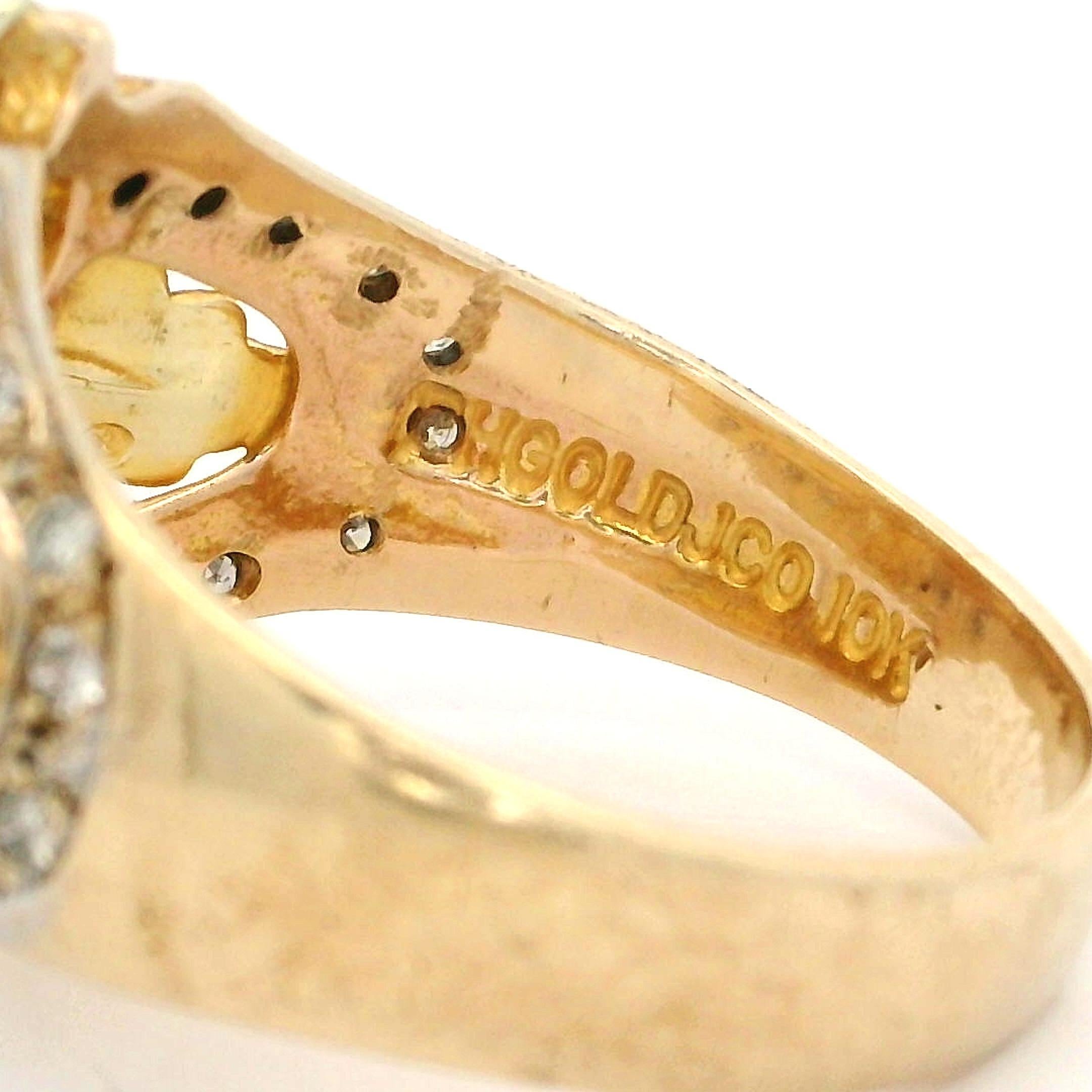 --Stone(s):--
(21) Natural Genuine Diamonds - Round Brilliant Cut - Pave Set - Nice Brilliant White Diamonds - 0.20ctw (approx.)

Material: 10k Rose, Yellow & White Gold (tri color)
Weight: 6.21 Grams
Ring Size: 9.5 (Fitted on a finger, please