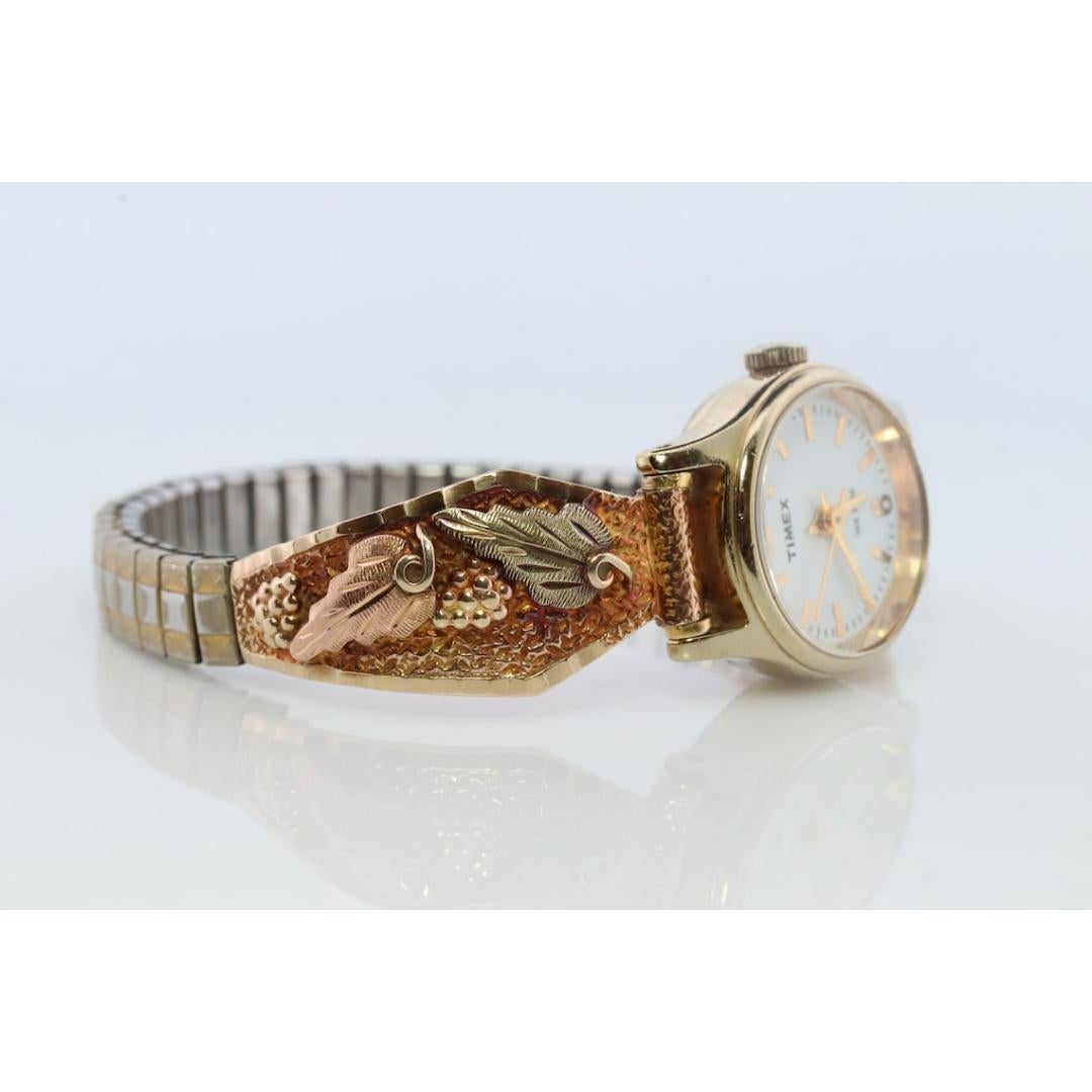 Women's Black Hills Gold 10k Lug Tips with Speidel Band. TIMEX Ladies WR 30M Quartz For Sale