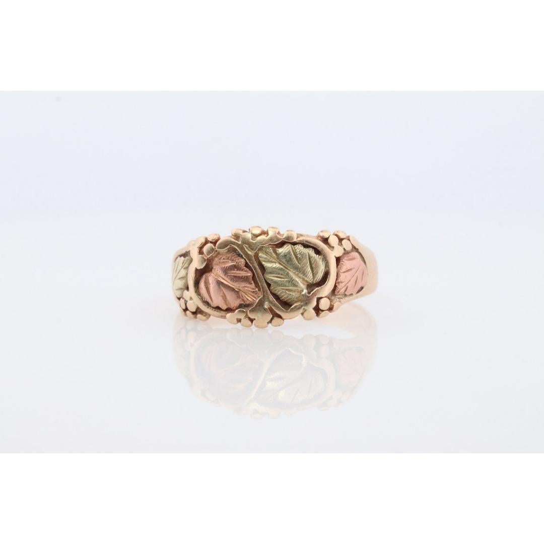 Vintage from before 2000
Size: 13 US
Materials: Gold
Band color: Gold

Style: Minimalist

Black Hills Gold ring. 10k Tri-tone wide Dome band.

Details:
12mm to 4.5mm band
5.1grams total weight
