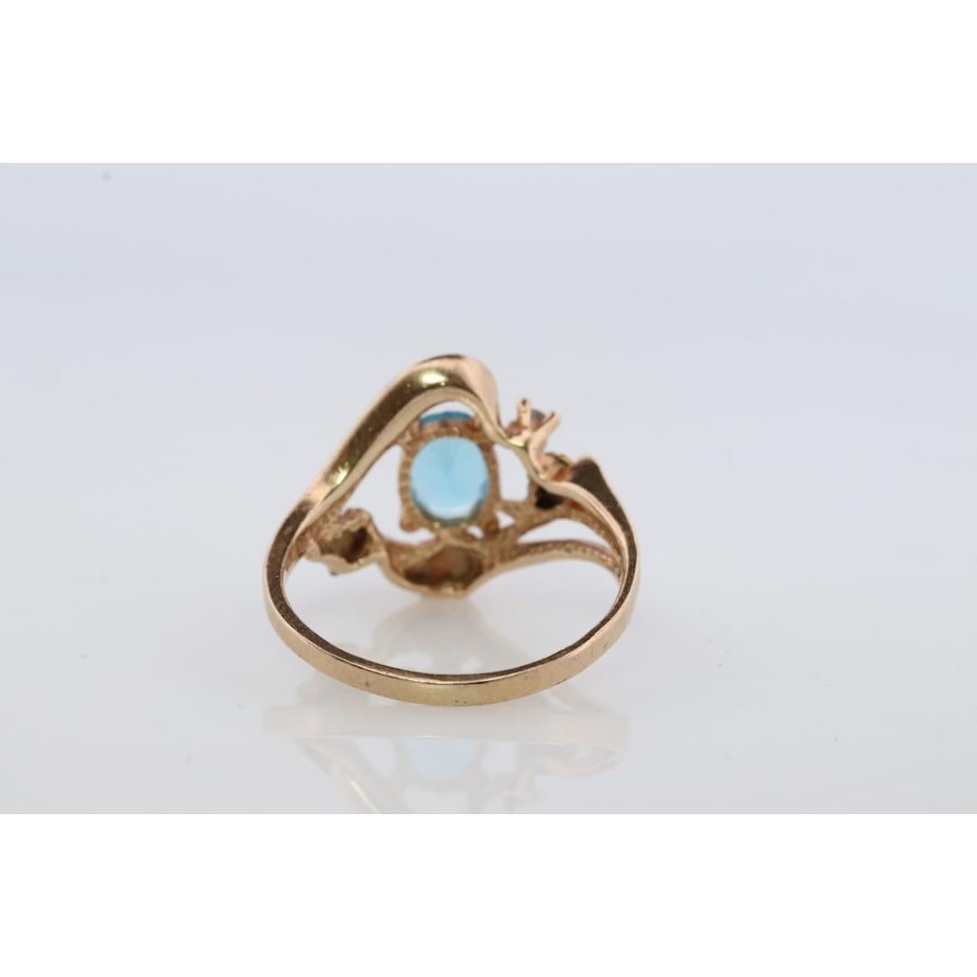 Donna Anello in oro Black Hills. Anello in oro delle Hille nere con diamanti e topazio blu multitono da 10 carati in vendita