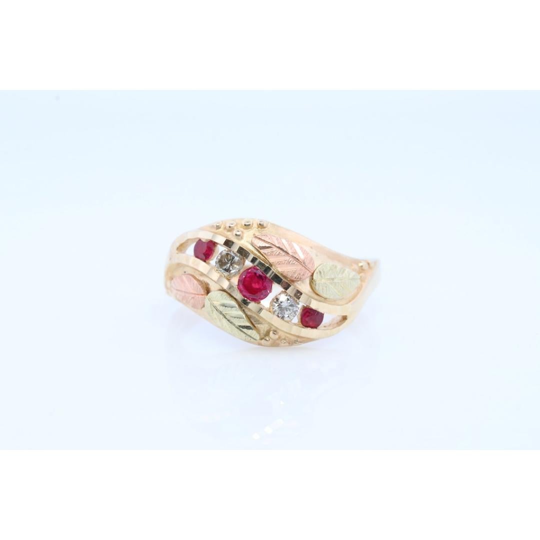 Vintage
Size: 7 US
Materials: White gold
Gemstone: Diamond
Gem color: Colorless
Band color: Yellow
Adjustable

Style: Mid-century

Vintage and an easily recognizable Black Hills Multi-tone Ring with diamonds.

Shows little to no use.

10k yellow and