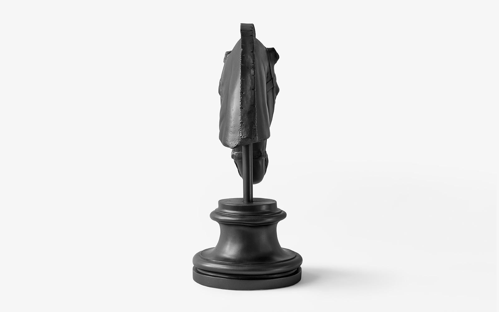 black horse head statue