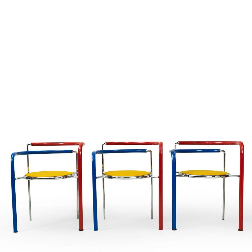 A Postmodern “Black Horse” ensemble of three chairs and table, by designers Rud Thygesen and Johnny Sørensen, produced by Botium (Denmark) during the 1980s.

The colorful style and playful shapes of this set is representative of the typical
