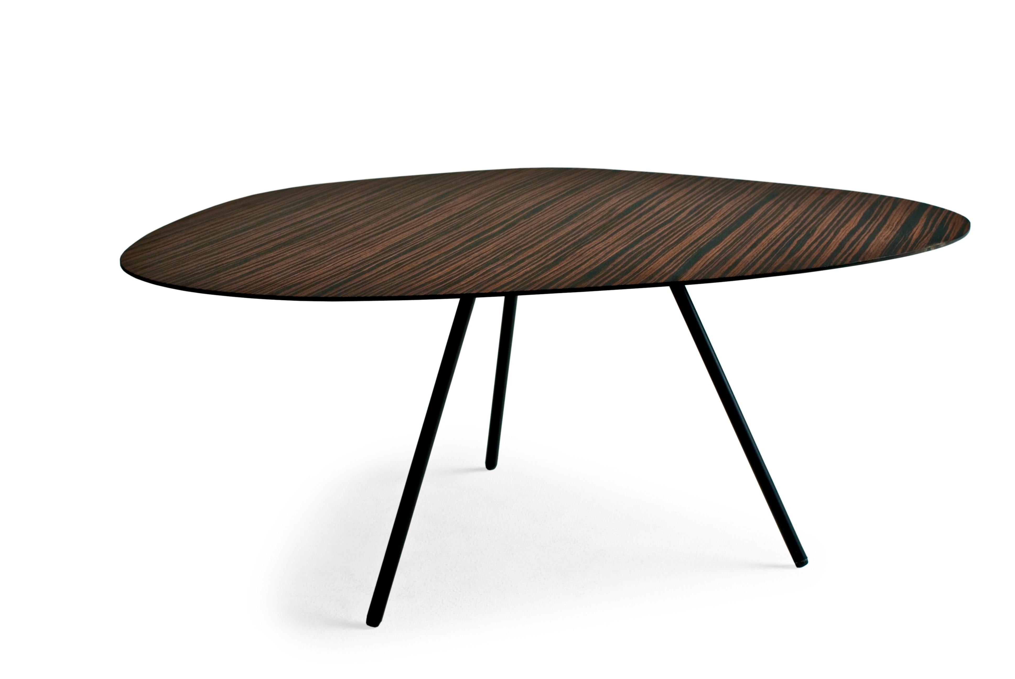 Black Medium Pebble coffee table by Kenneth Cobonpue.
Materials: Black, sapele, steel. 
Also available in other colors and for outdoors.
Dimensions: 53 cm x 71 cm x H 30 cm 

Pebble playfully echoes shapes found in nature like stepping-stones