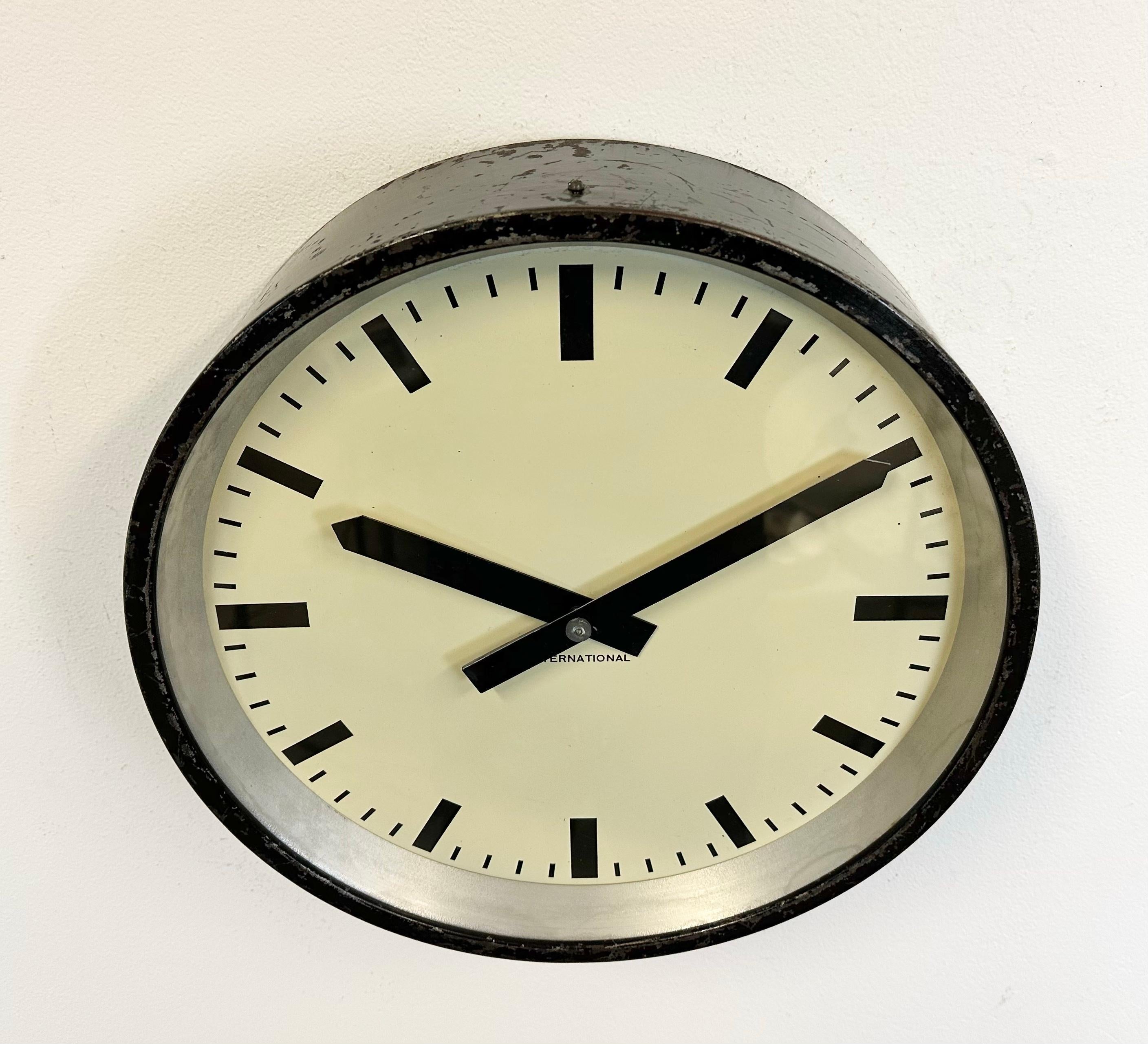 German Black Industrial Factory Wall Clock from International, 1950s For Sale