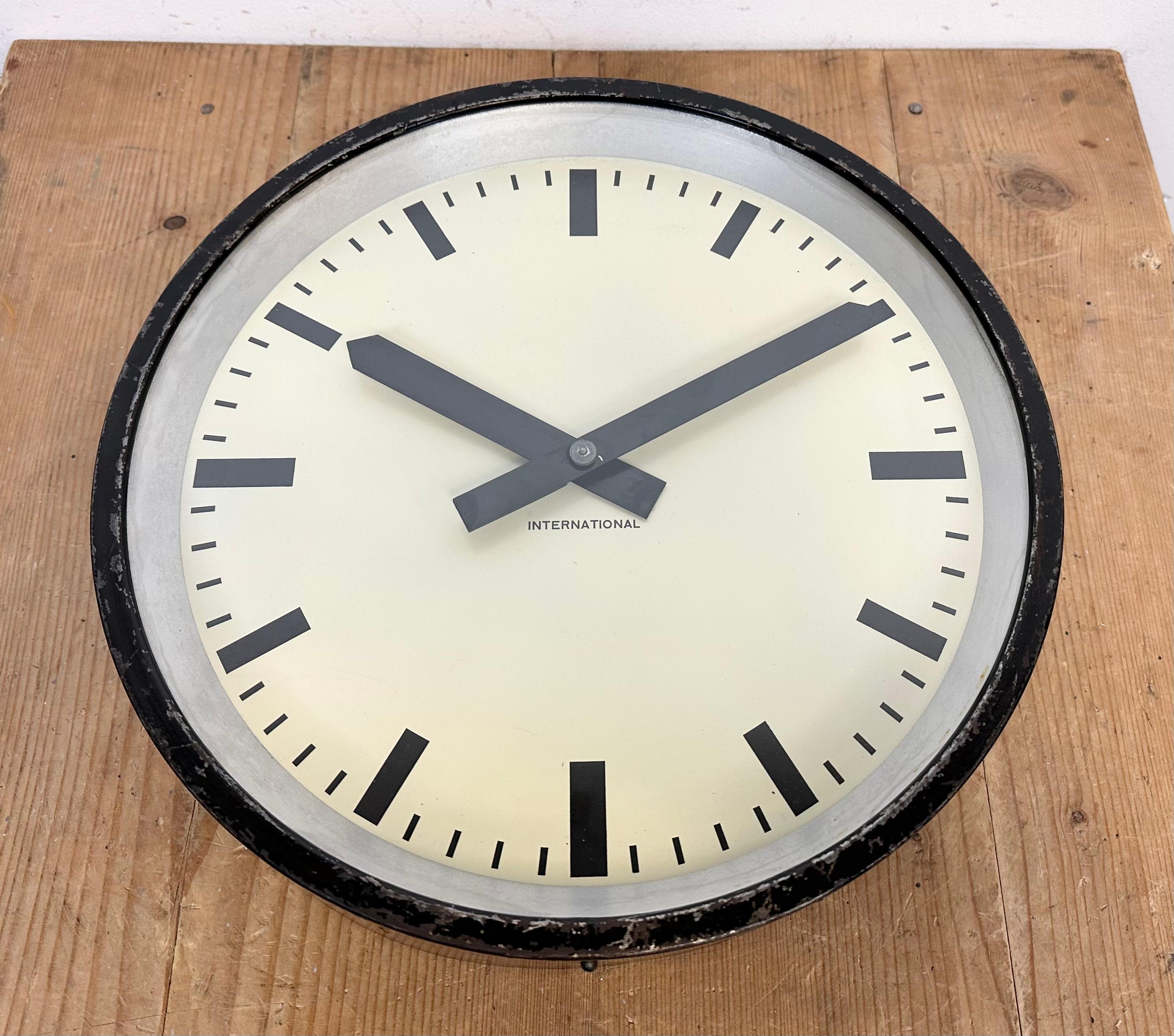 Glass Black Industrial Factory Wall Clock from International, 1950s For Sale
