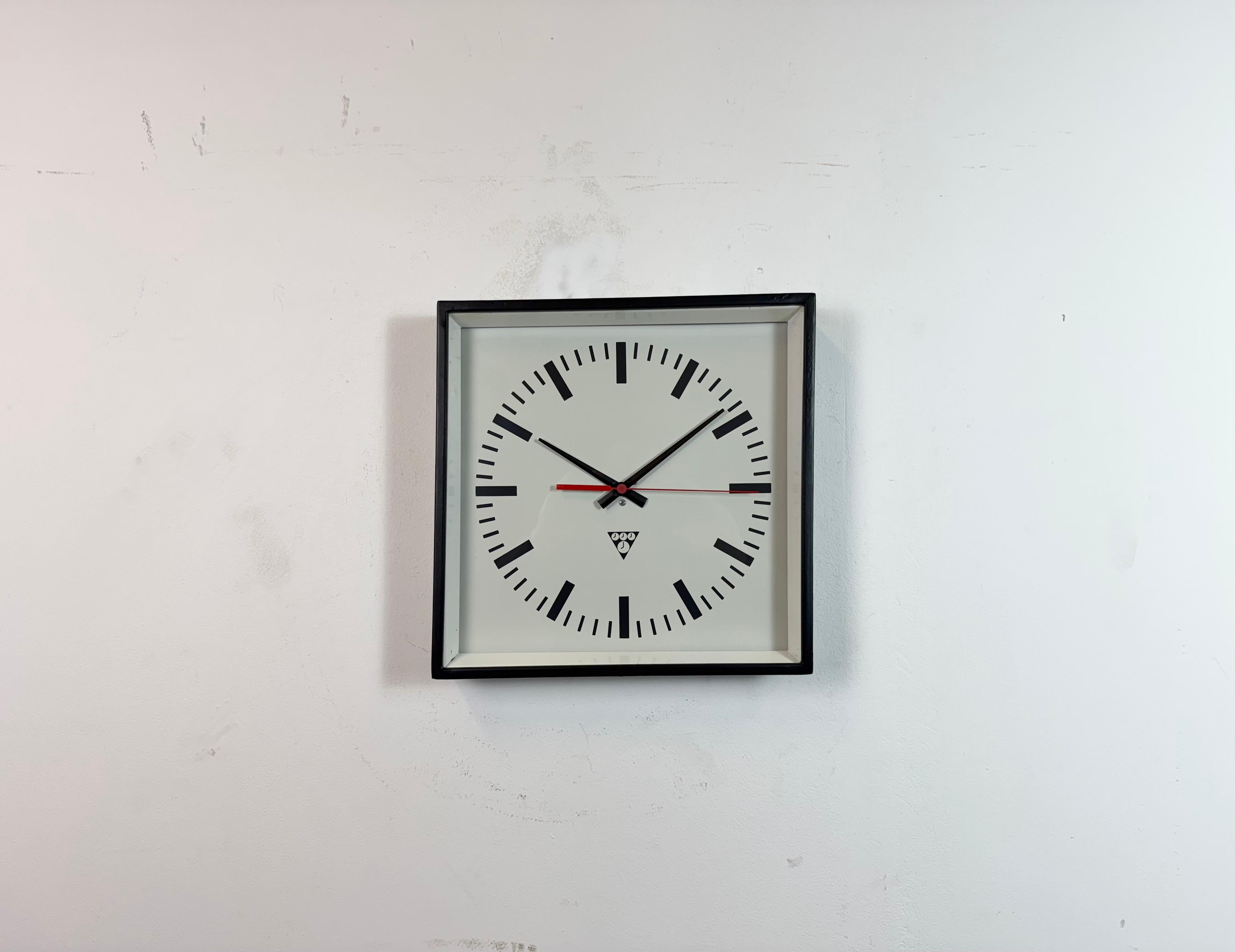 - Wall clock designed by Pragotron in former Czechoslovakia during the 1970s and made till 1990s
- Was used in factories, schools and railway stations 
- Black painted metal frame
- Aluminium dial and hands 
- Clear glass cover 
- Former electric