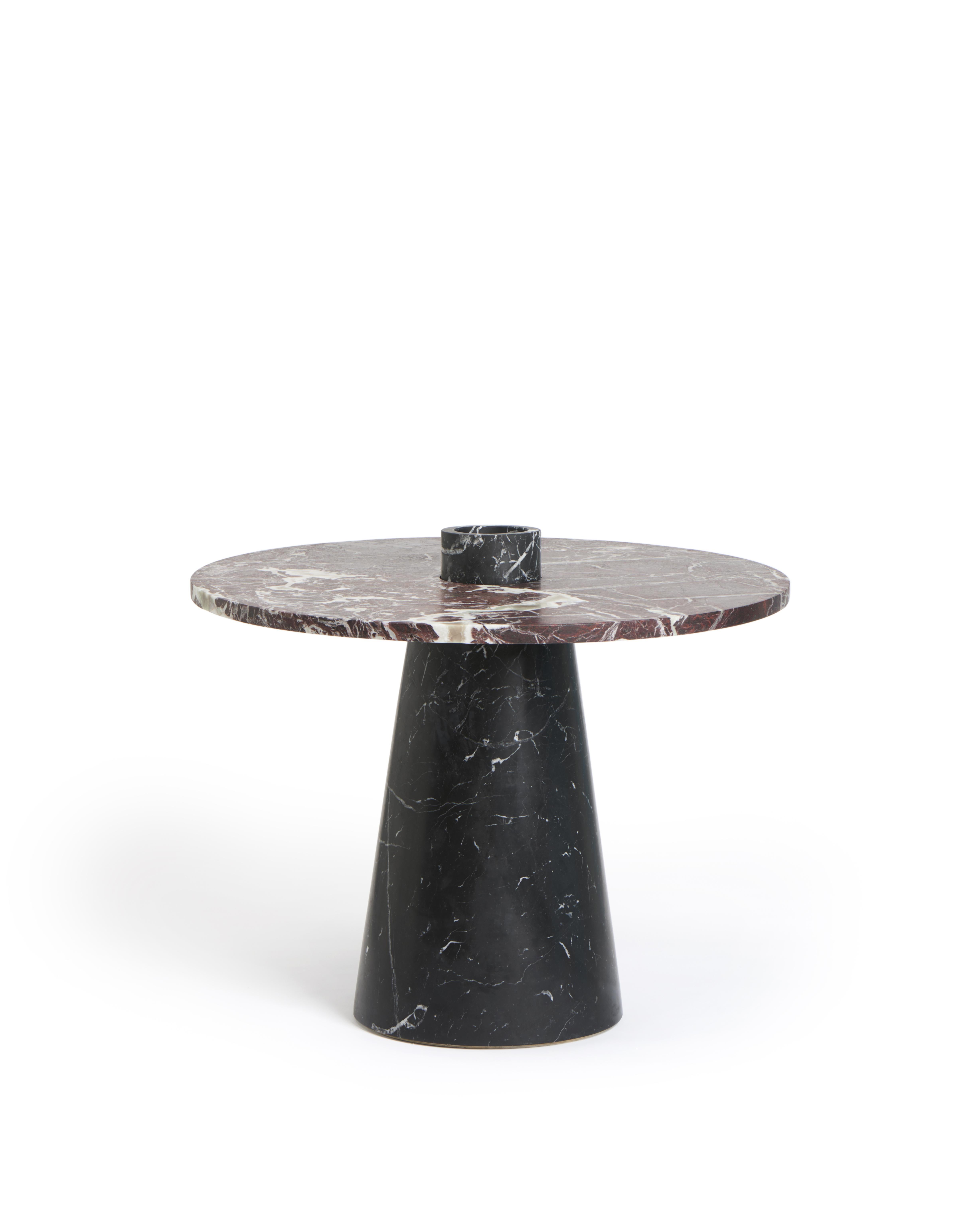 Black inside out coffee table set by Karen Chekerdjian
Dimensions: 58 x 32 x 70 cm
Materials: Rosso Levanto, Nero Marquinia
Includes: Coffee table with fruit bowl, candle holder, flower vase in red marble

Karen’s trajectory into designing was