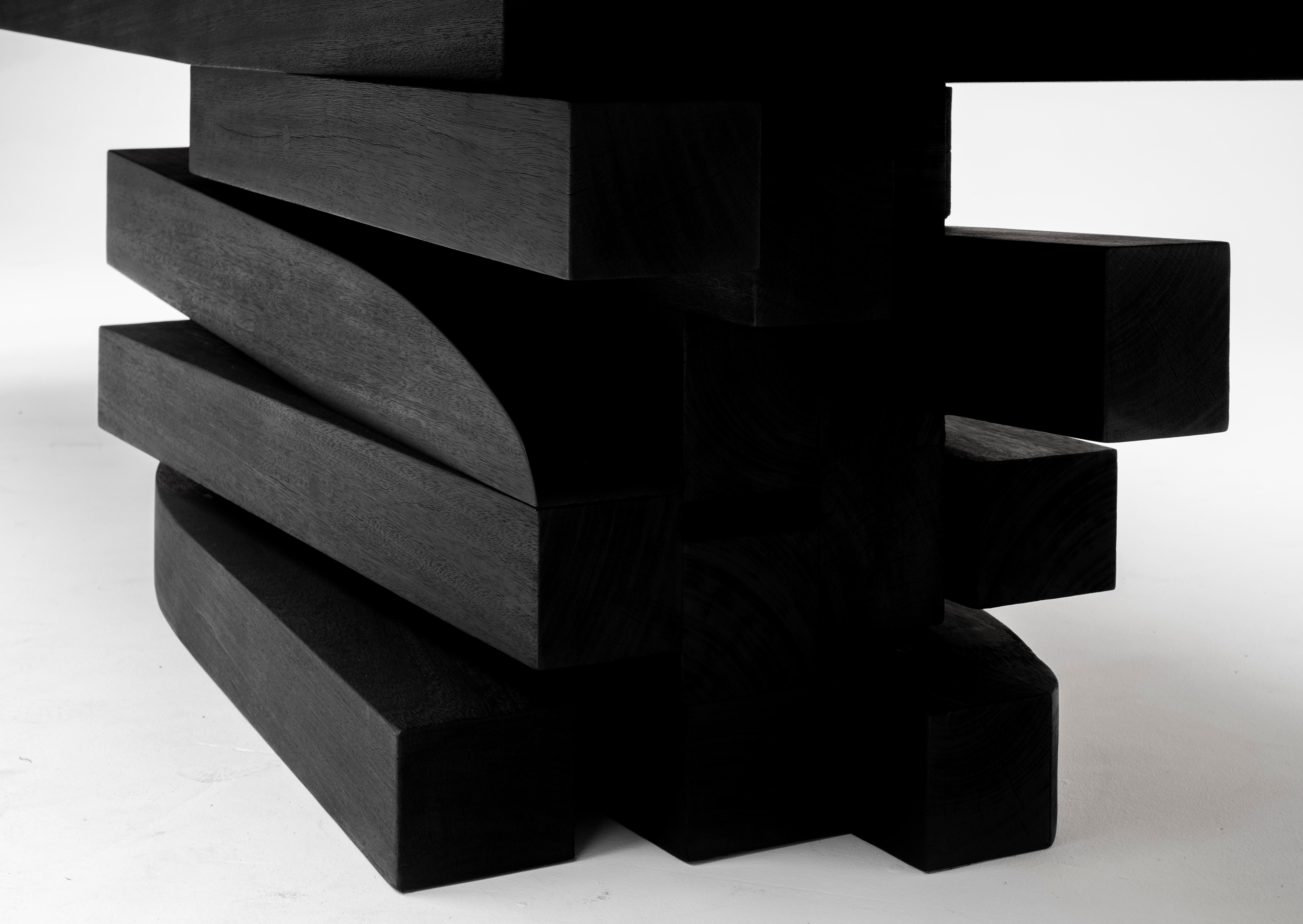Burnished Black Iroko wood Zoumey table 012024 by Arno Declercq For Sale