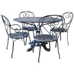 Table et chaises d'extérieur en fer noir pour patio français