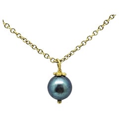 Black is Beautiful Pearl with Petal Cap in 18K Green Gold