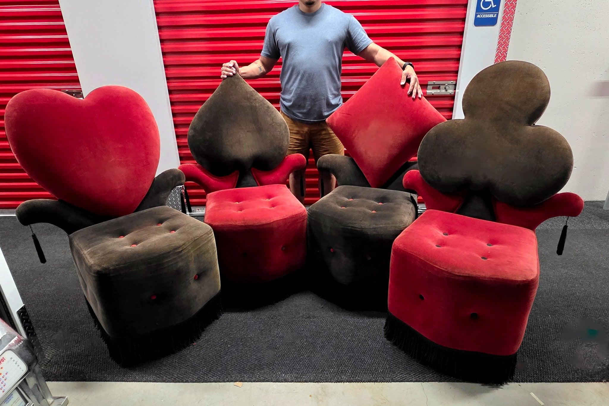 Set of four Blackjack lounge chairs.

This unique set of four Blackjack chairs is sure to add a touch of whimsy to your home decor. The set includes four chairs, each designed to resemble one of the four suits of playing cards: clubs, diamonds,