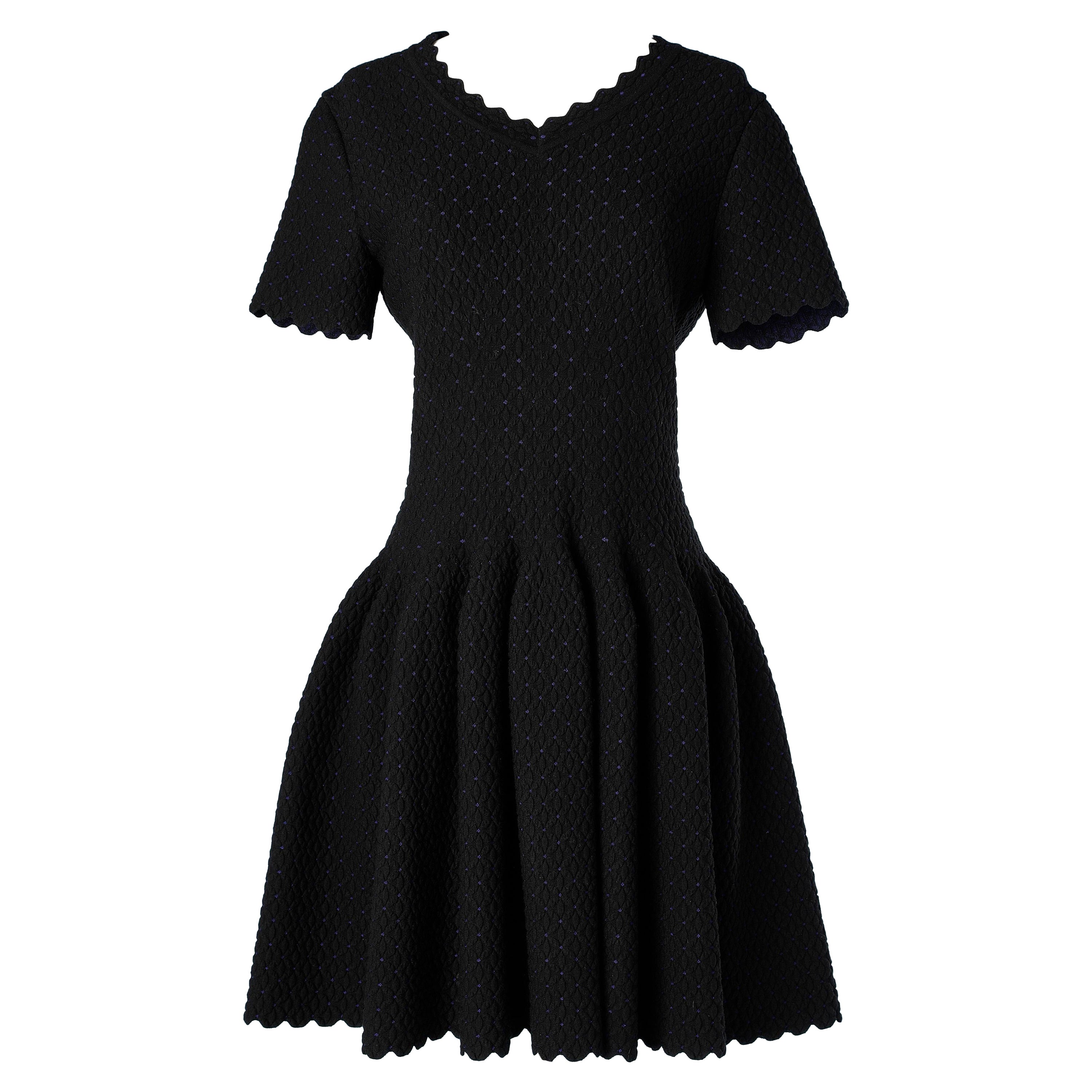 Abito nero in maglia jacquard con maniche corte AlaÏa