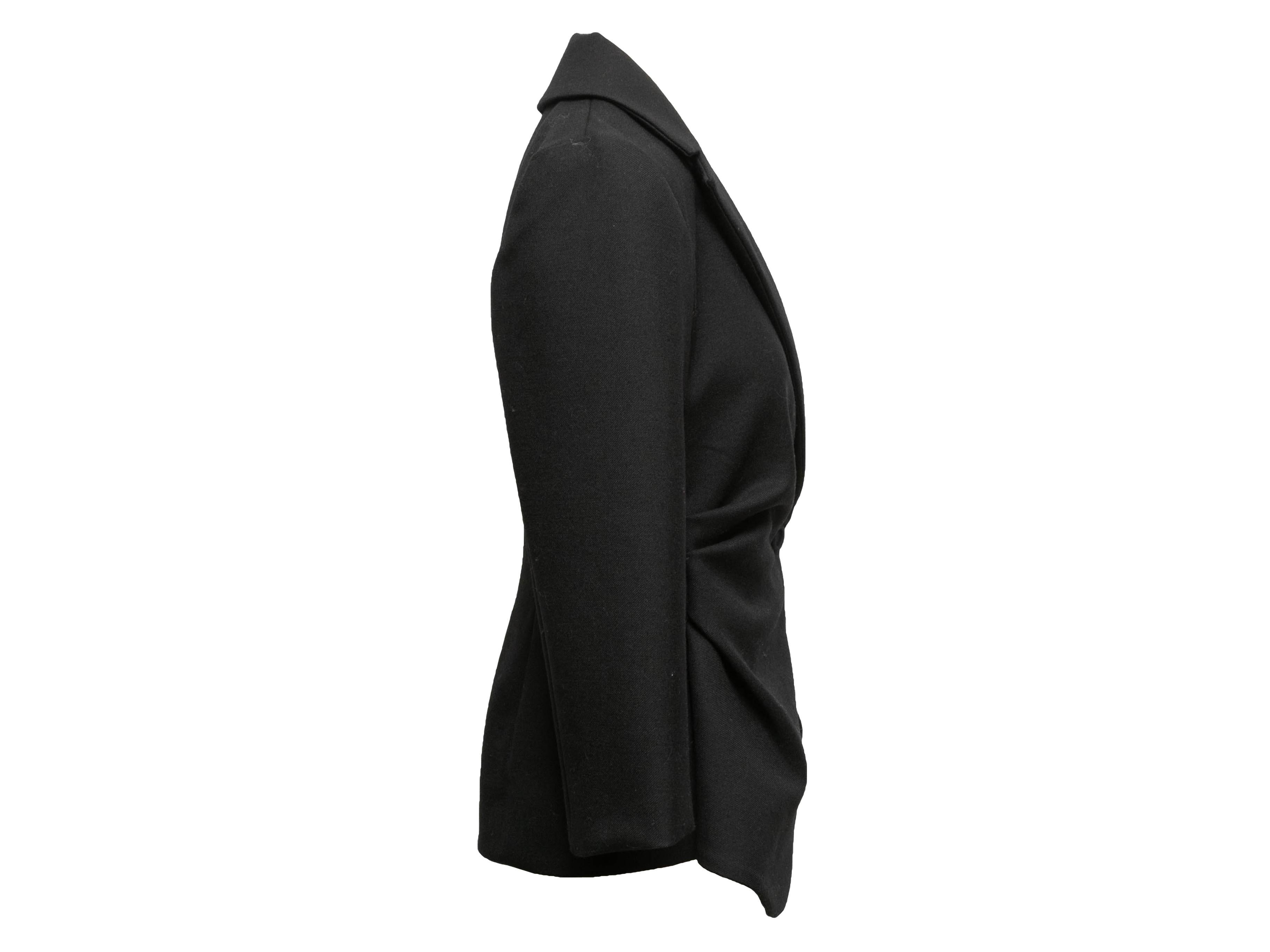Black wool Le Souk asymmetrical blazer by Jacquemus. Notched lapel. Single front button closure. 35