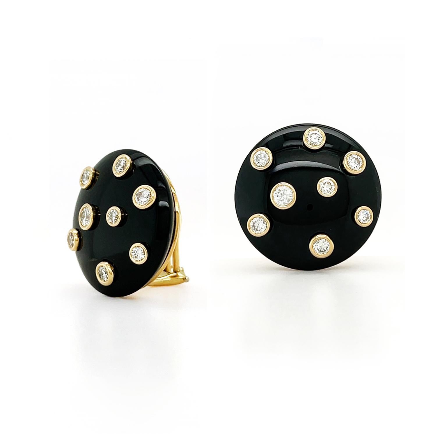 Flickers of sparkling light underline the depth of black jade for these earrings. A round cut with a soft dome of black jade is ornamented with a dispersed bezel set of brilliant-cut diamonds. The 18k yellow gold settings provide an additional touch
